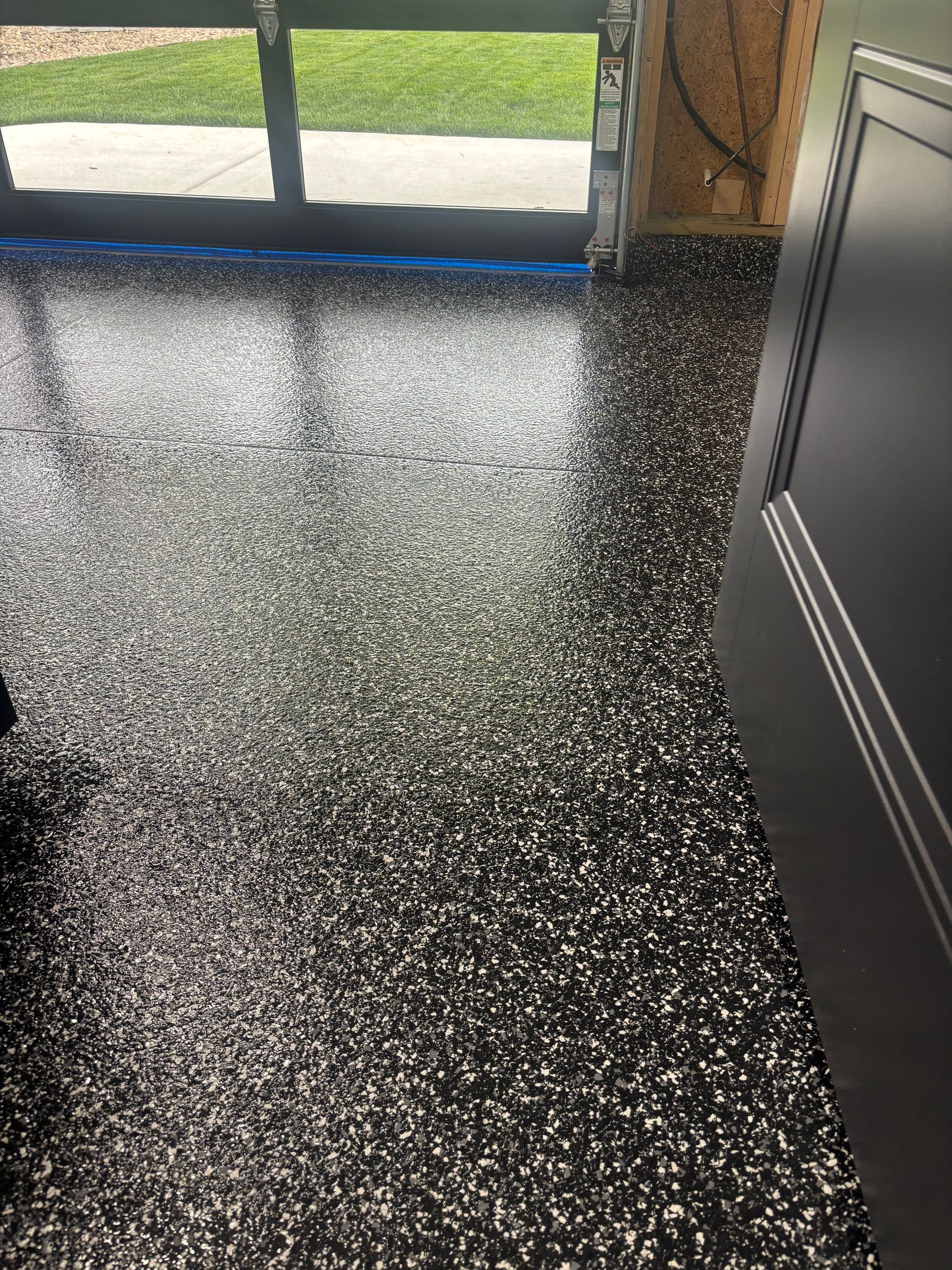 Custom Flake Epoxy Garage Floor in Lincoln by Goat Coatings
