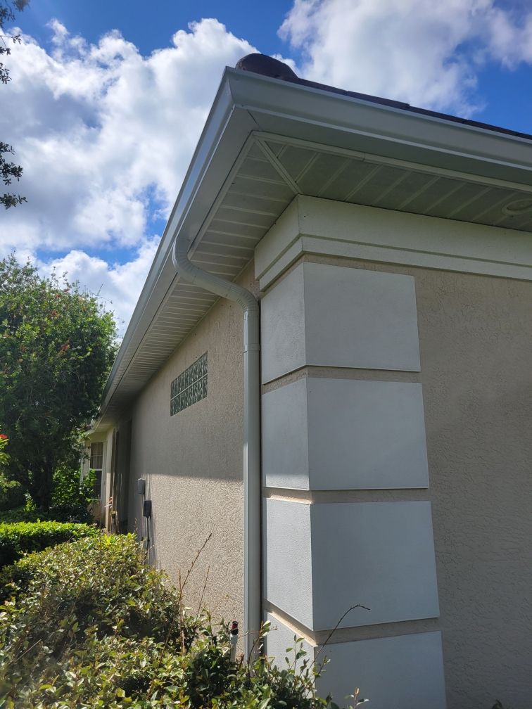 6-inch Seamless Gutter Installation with Splash Guard in University Park, FL by Gutter Professors