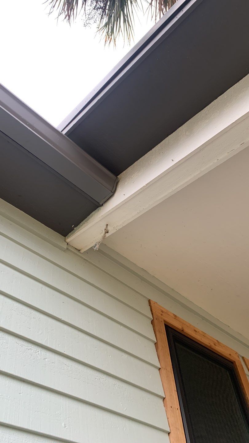 Seamless Gutter Installation using Charcoal Grey Gutters by Gutter Professors
