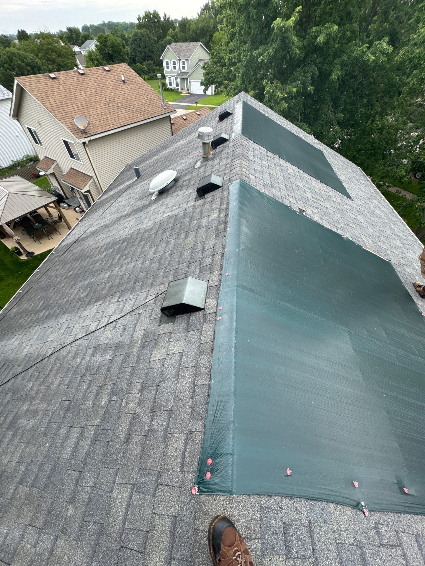 Roof and gutter replacement by hail and wind damage by Just Brilliant Restoration JBR