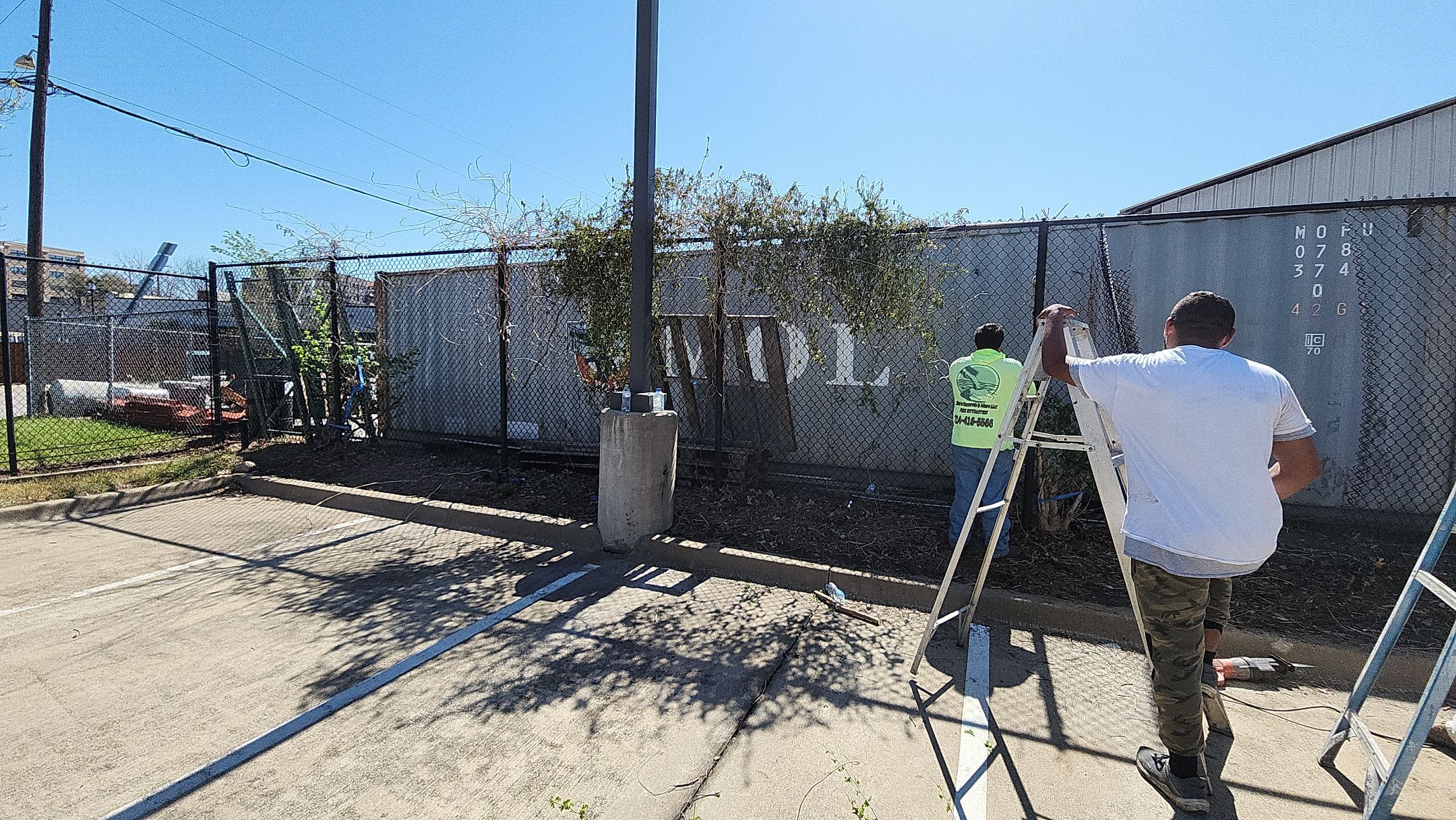 Chain link Privacy Slats by 3:16 Roofing and Construction
