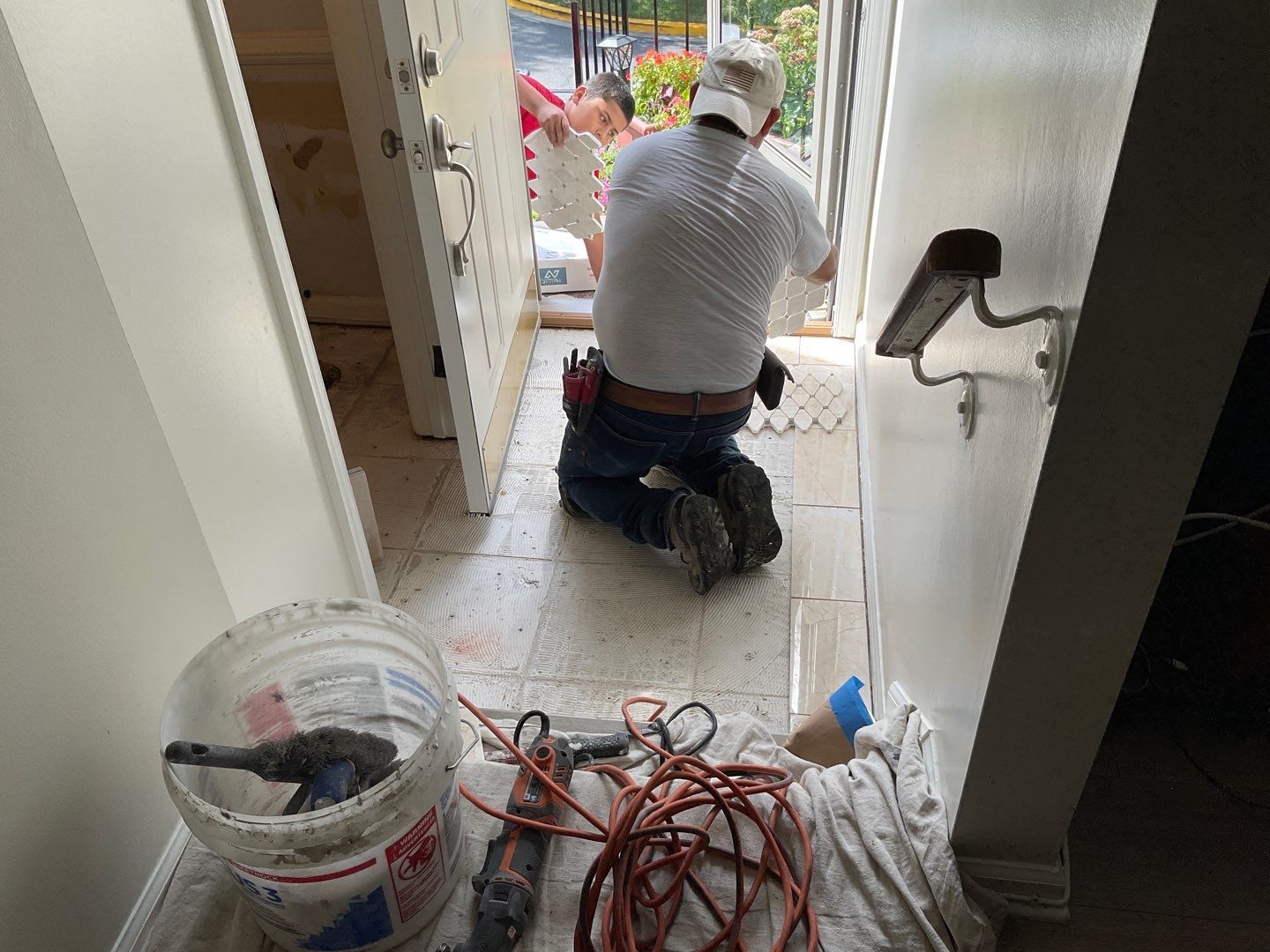 Bathroom Remodel using Two new bathroom design and new floors by Alpha Design Services