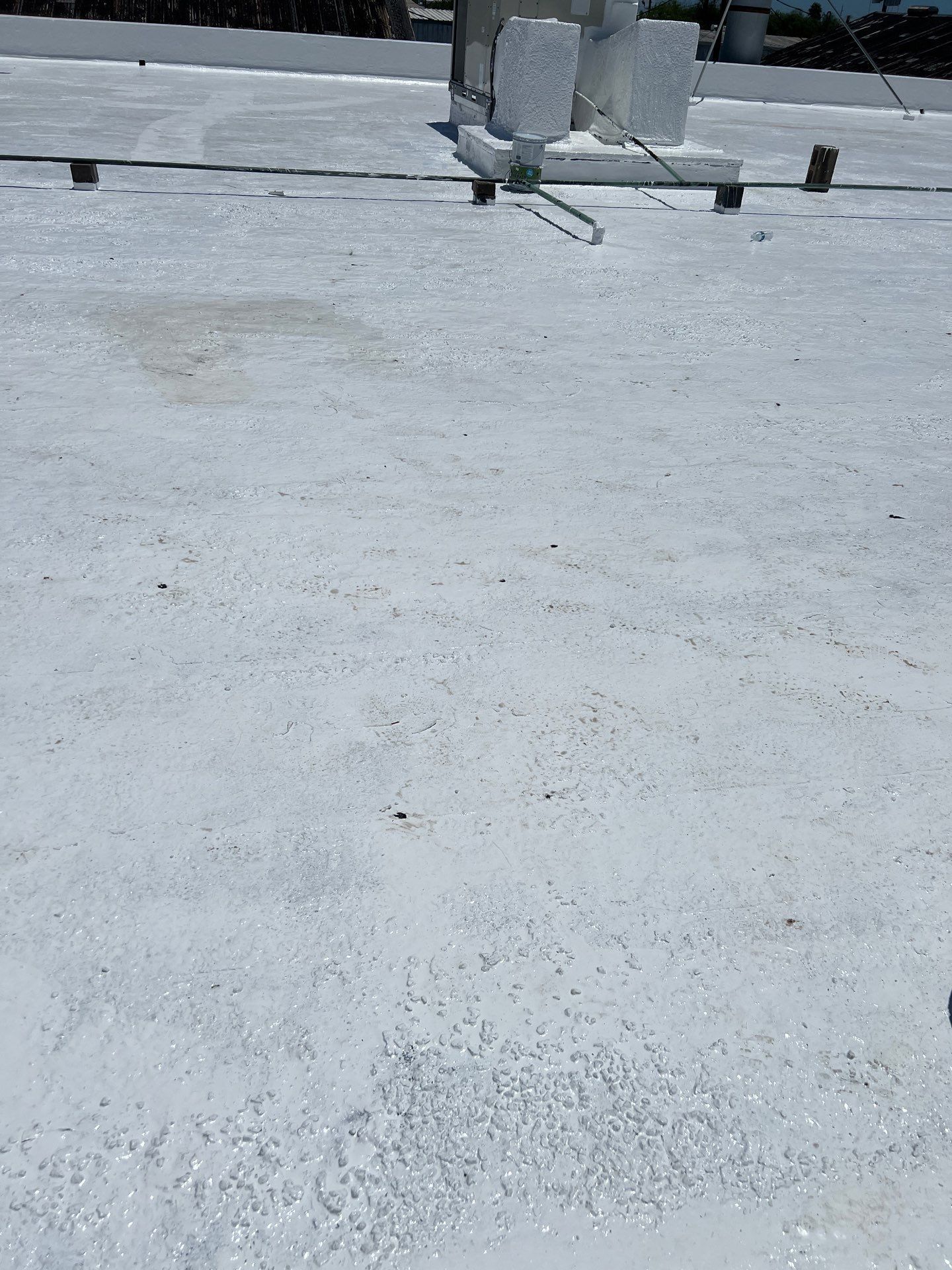 Dirty leaking Gravel Roof by Bayfront Roofing and Construction