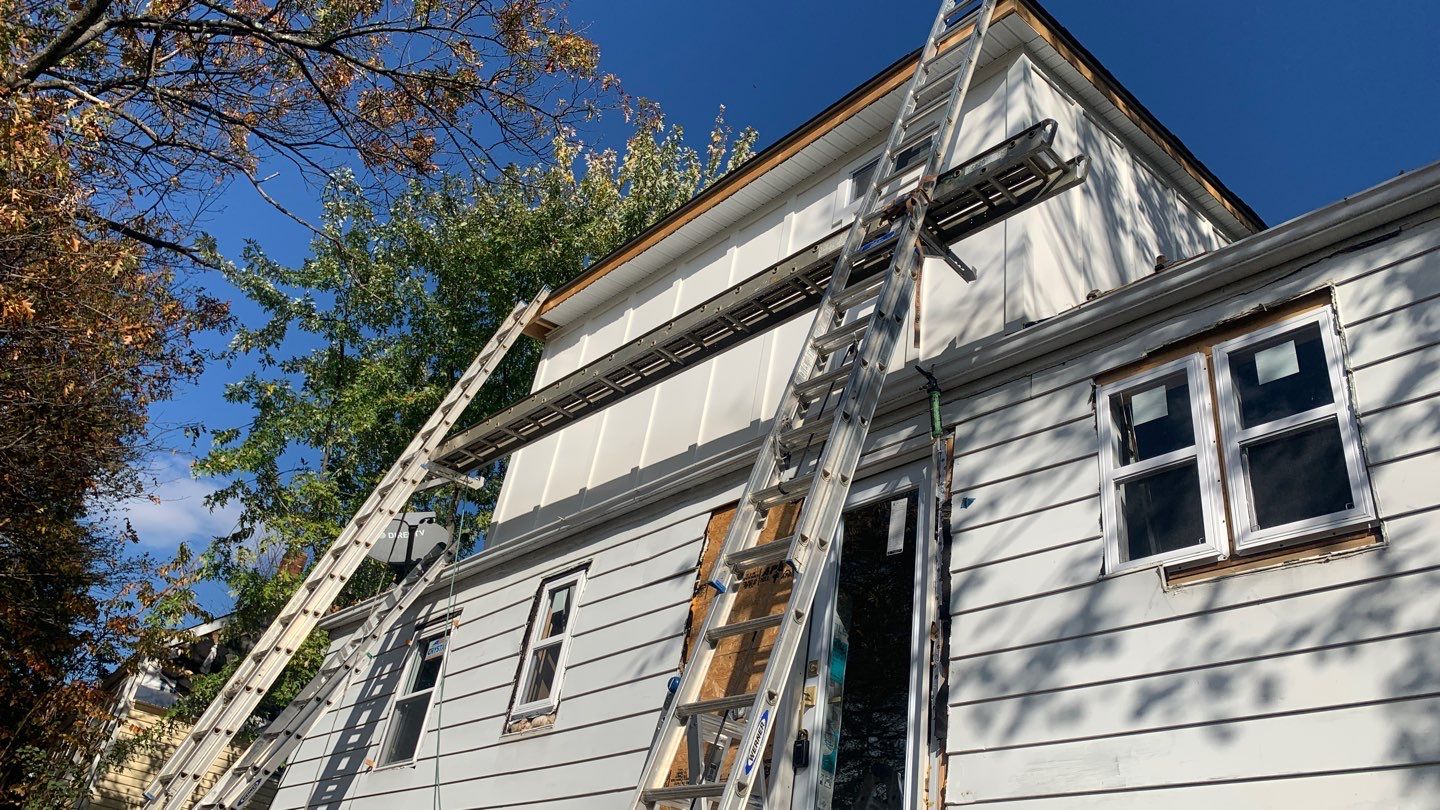 Room addition on the second floor of house by Greenspring Construction Services