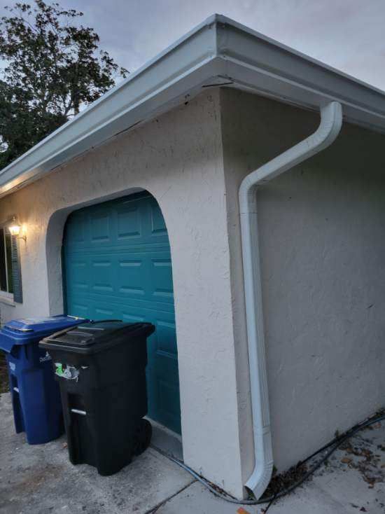 Seamless Gutter Installation using Splash Guard in Sarasota FL by Gutter Professors