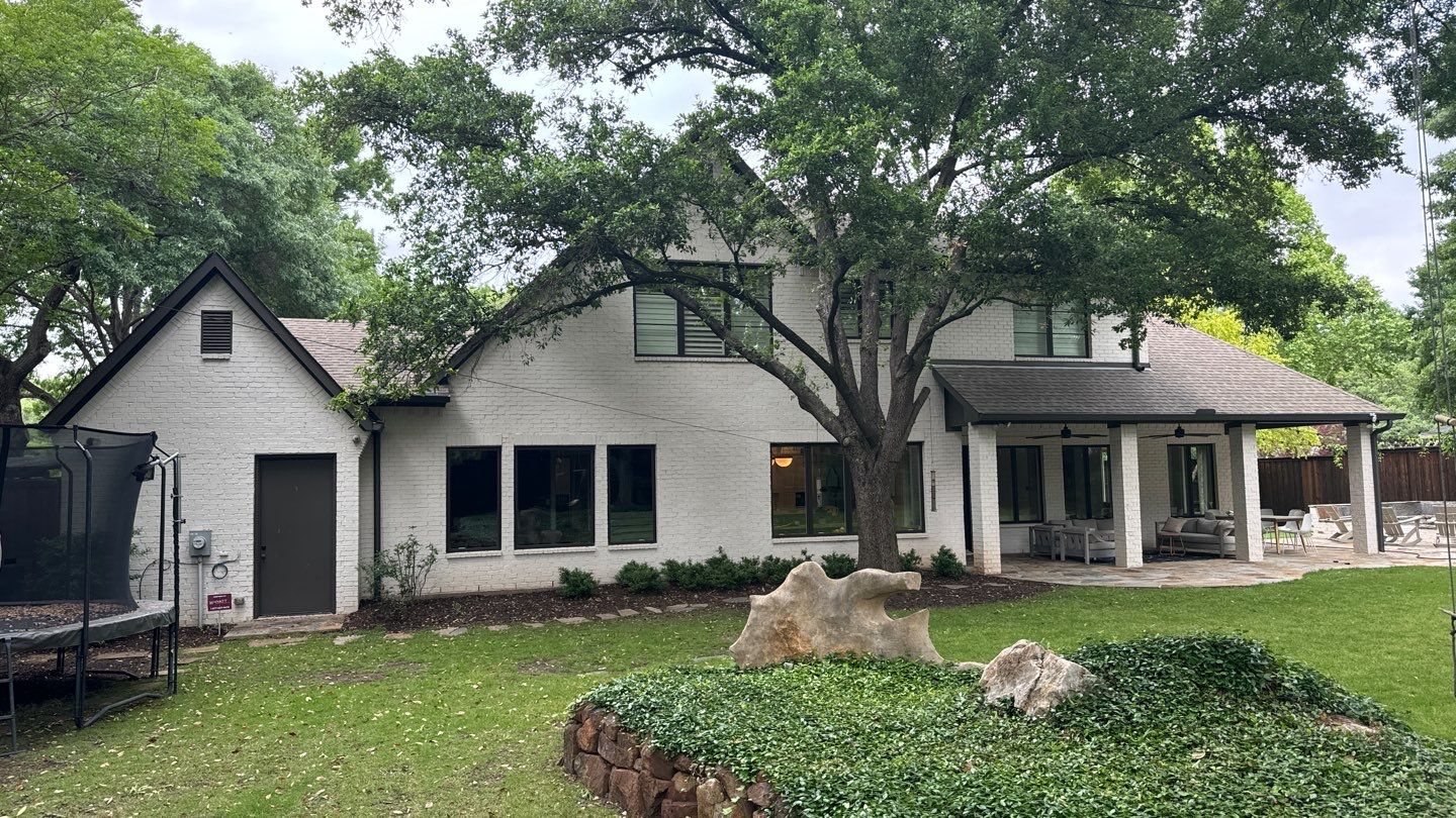 White brick with GAF Weathered Wood by Tejas Roofworks + Restoration