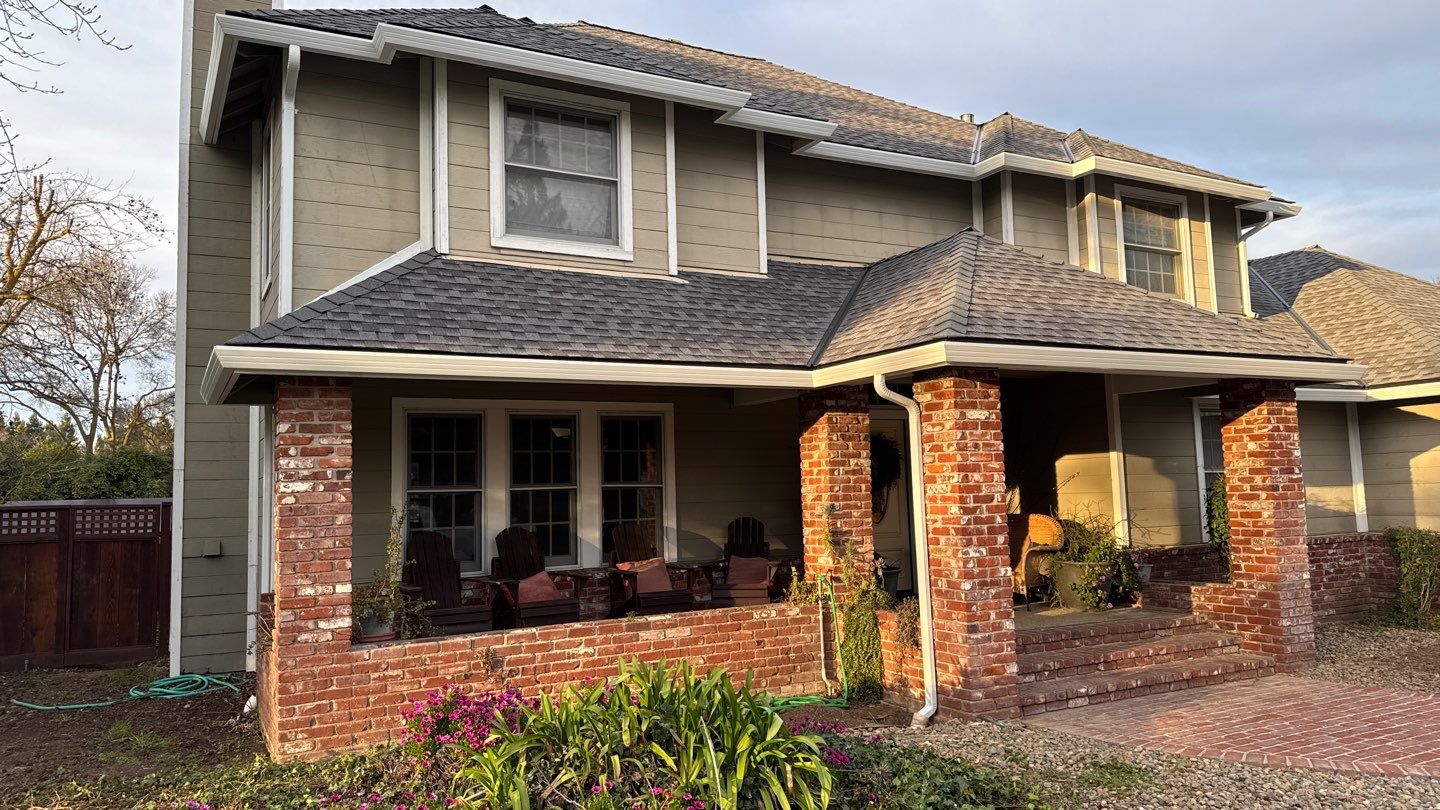 New shingles and gutters using GAF Timberline HDZ shingles and aluminum gutter by Straight Edge Roofing Inc