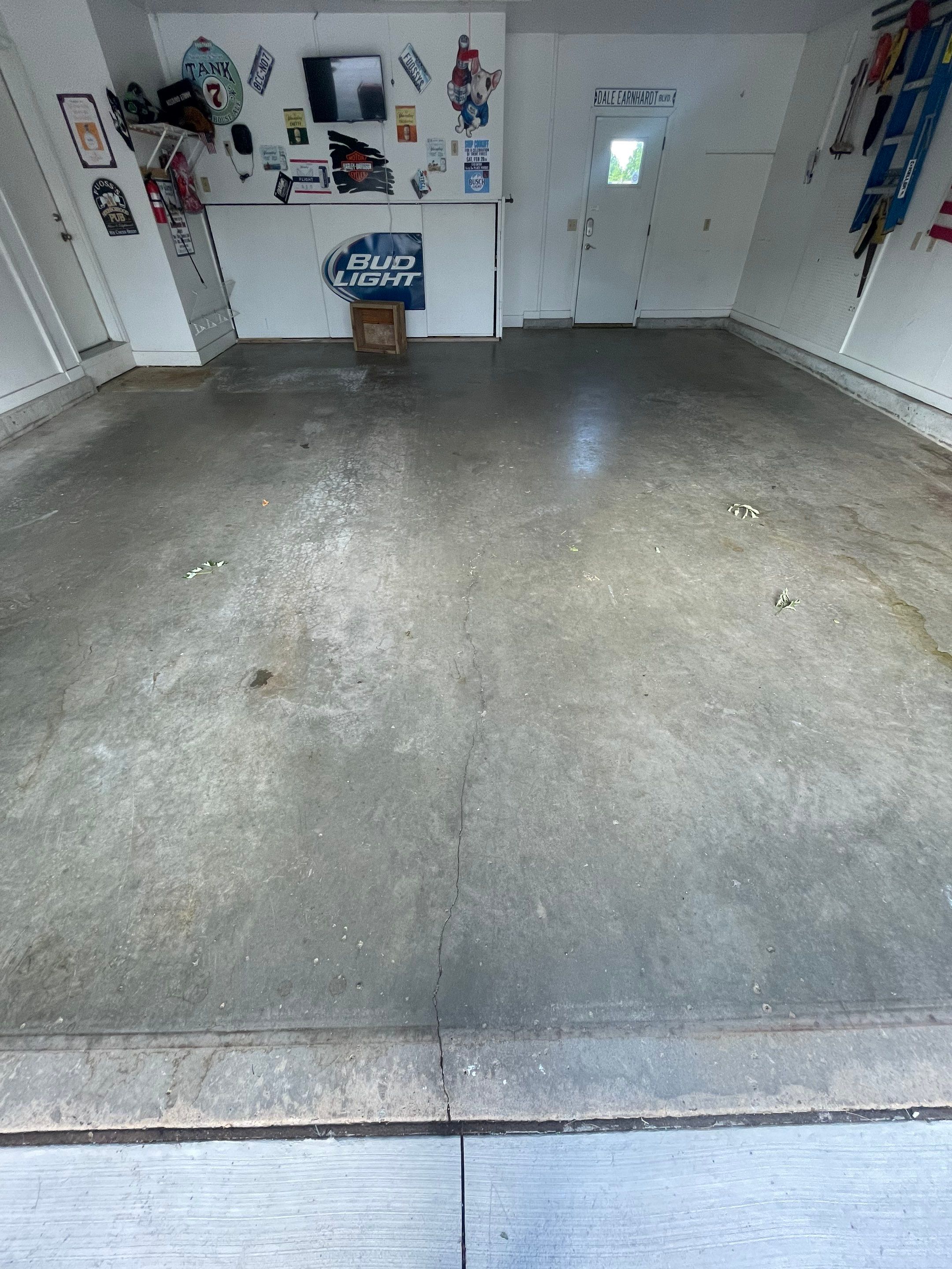 Residential Garage Floor Coating with Feather Grey Finish in Sioux Falls by Select Painting, Coatings & Garage Cabinets