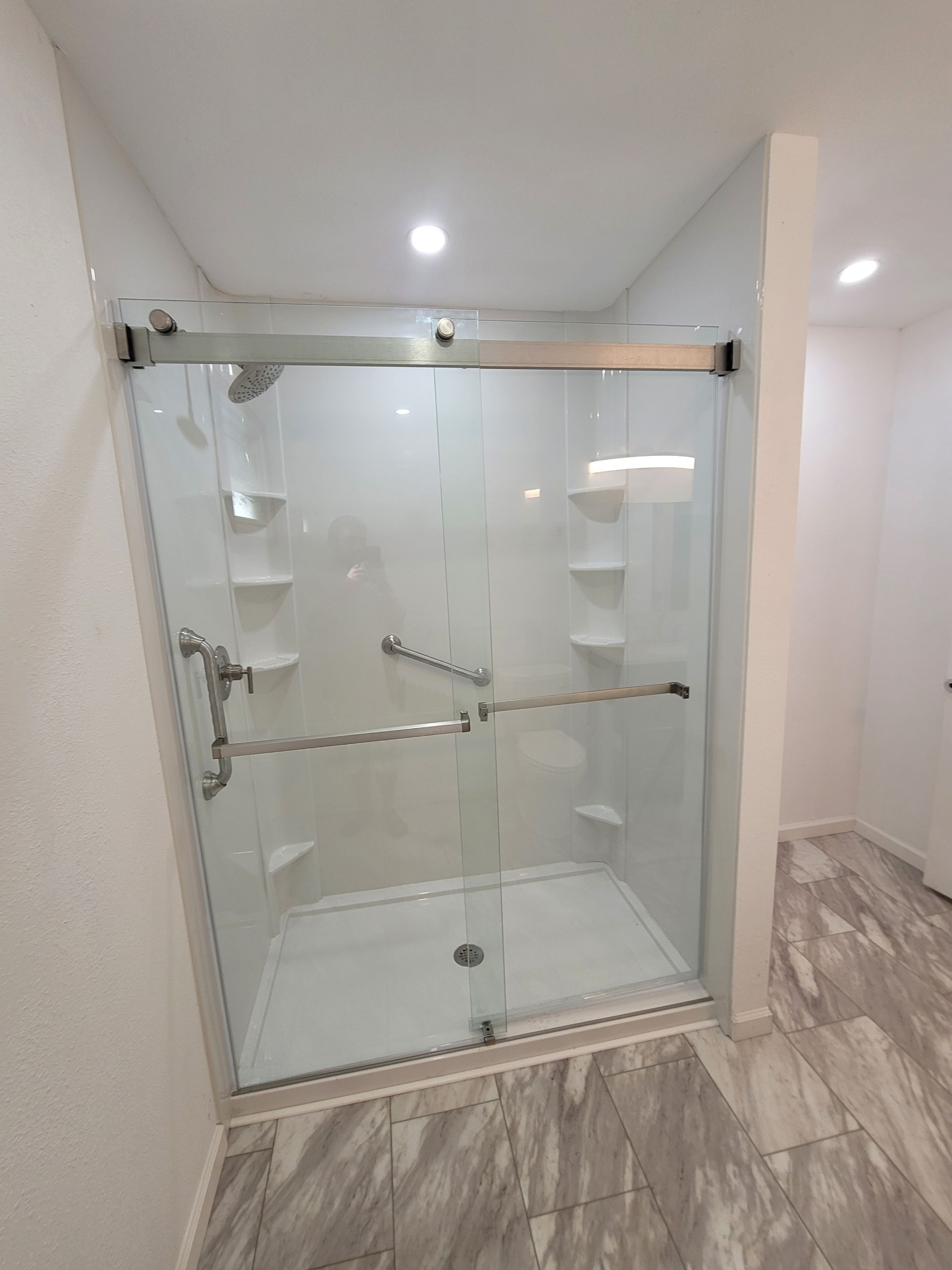 Corner tub to large shower by The Shower Company