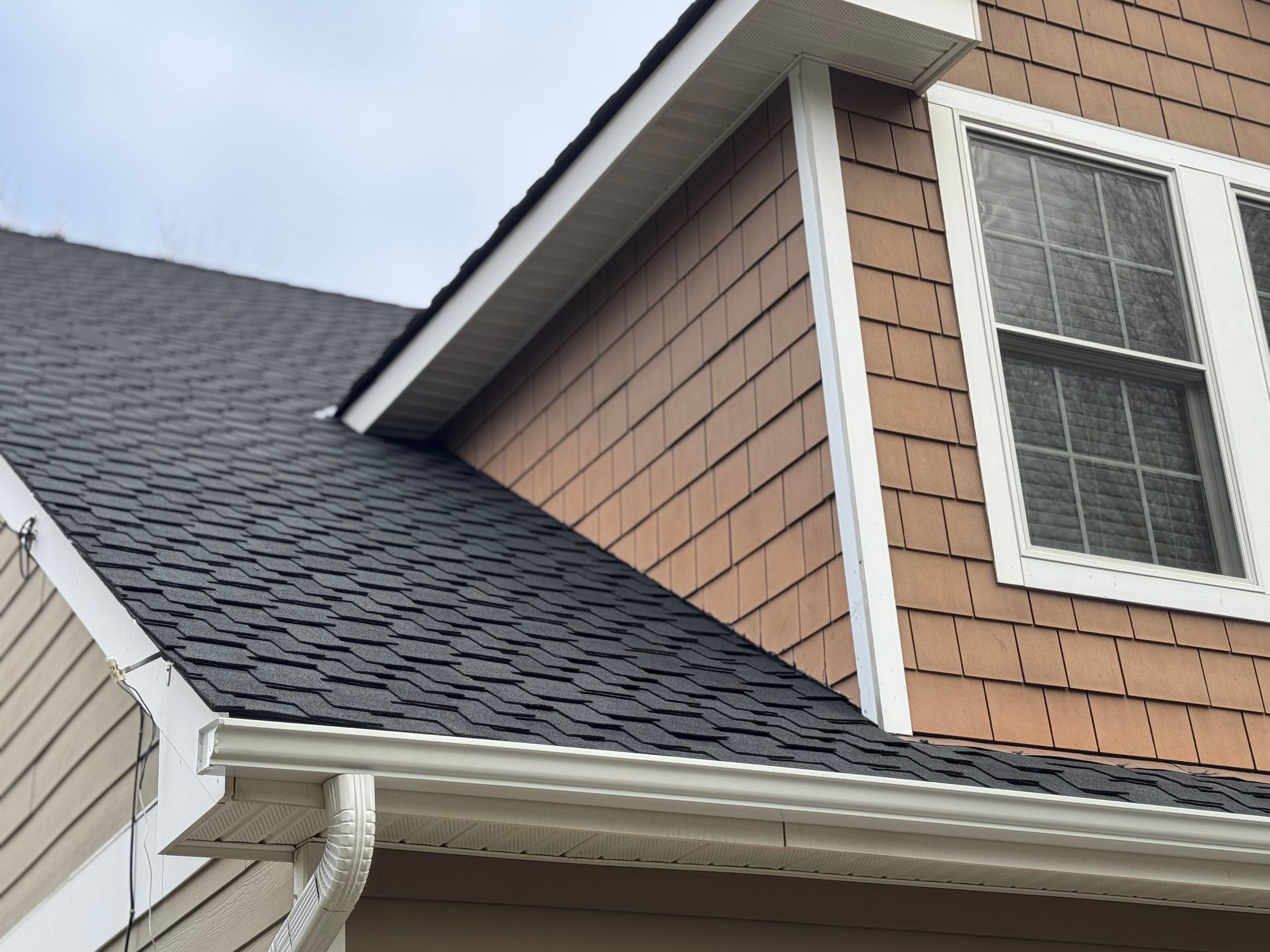 Storm Damage Restoration using CertainTeed Presidential Algae-Resistant Charcoal by USA Storm Roofing and Construction Group