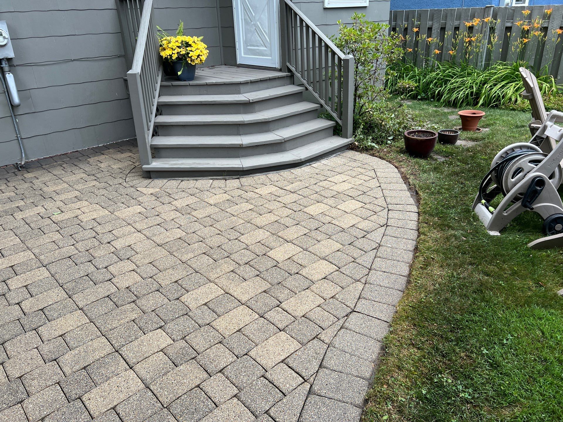 Brick paver cleaning and sealing by Northern Power Washing LLC.