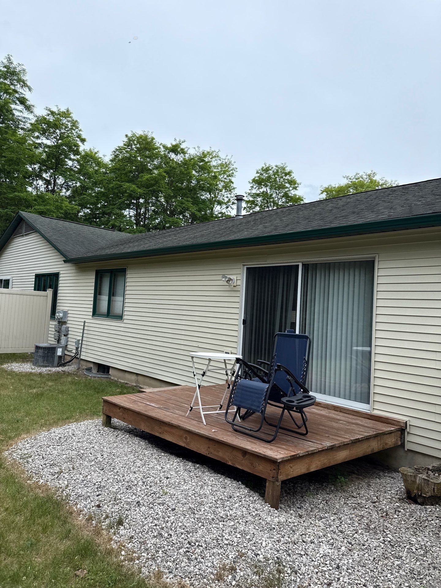 Gutter and Downspout Installation for Residence and Detached Garage in Traverse City by Rainbow Seamless Systems