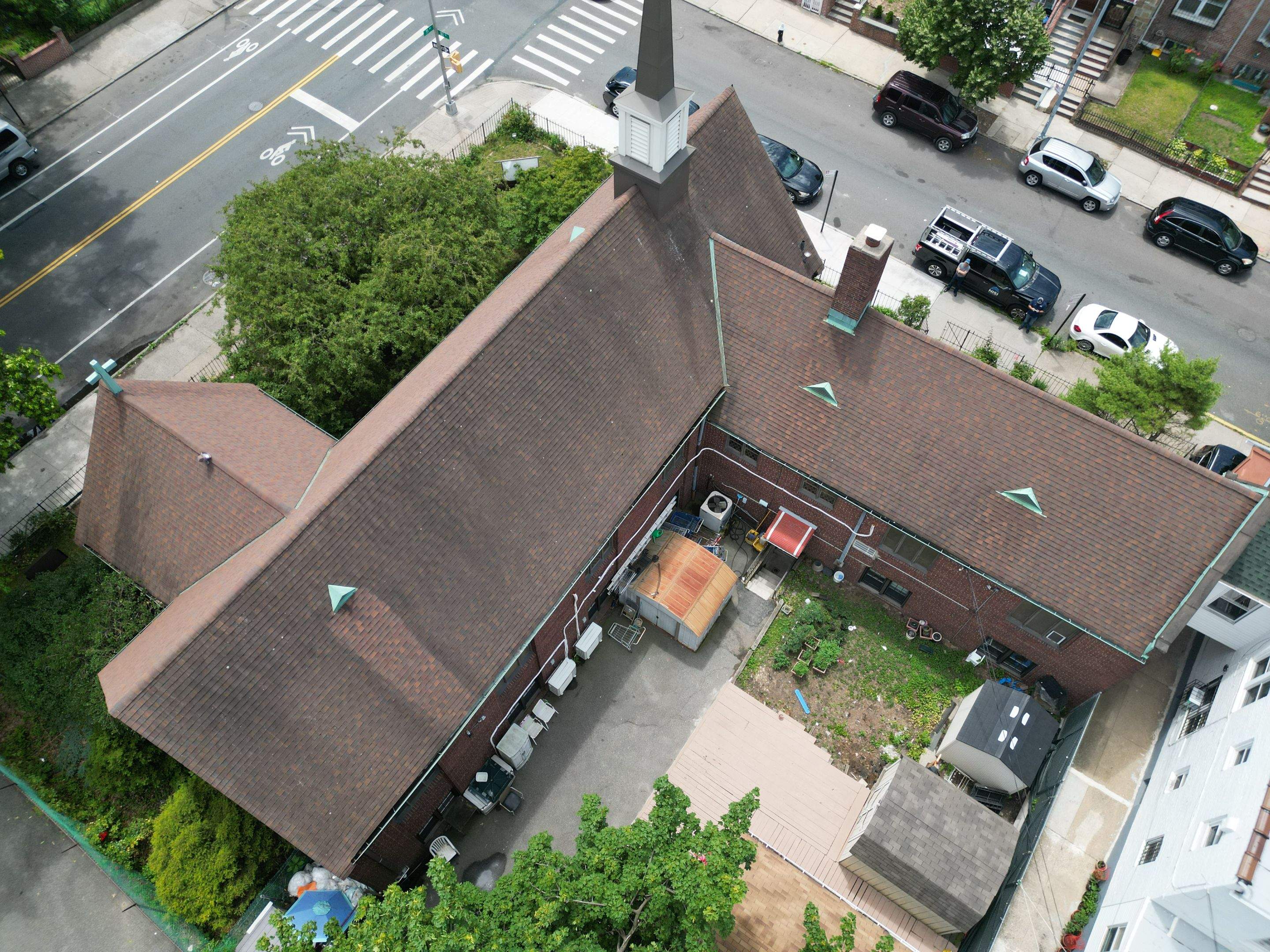 Owens Corning Duration® Shingles – Estate Gray, 6” Seamless Commercial-Grade Aluminum K-Style Gutters – Brown by Nisi Home Improvement