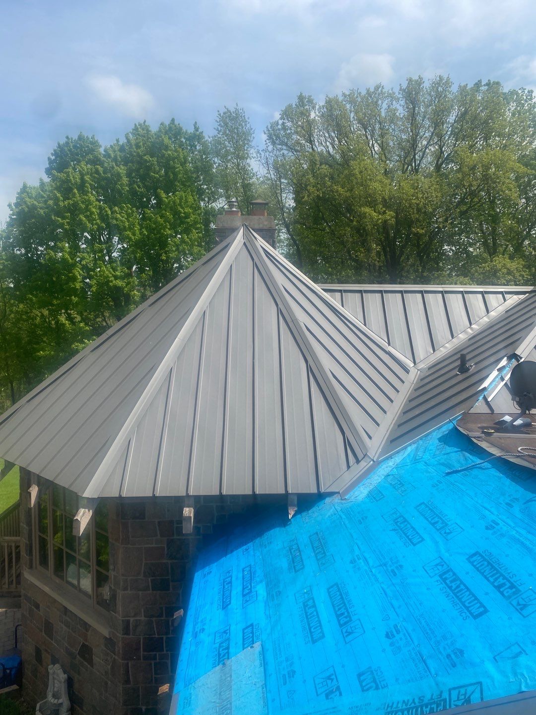 New Roof Installation using 16" Standing Seam Panels by Jay Carter Roofing & Sheet Metal