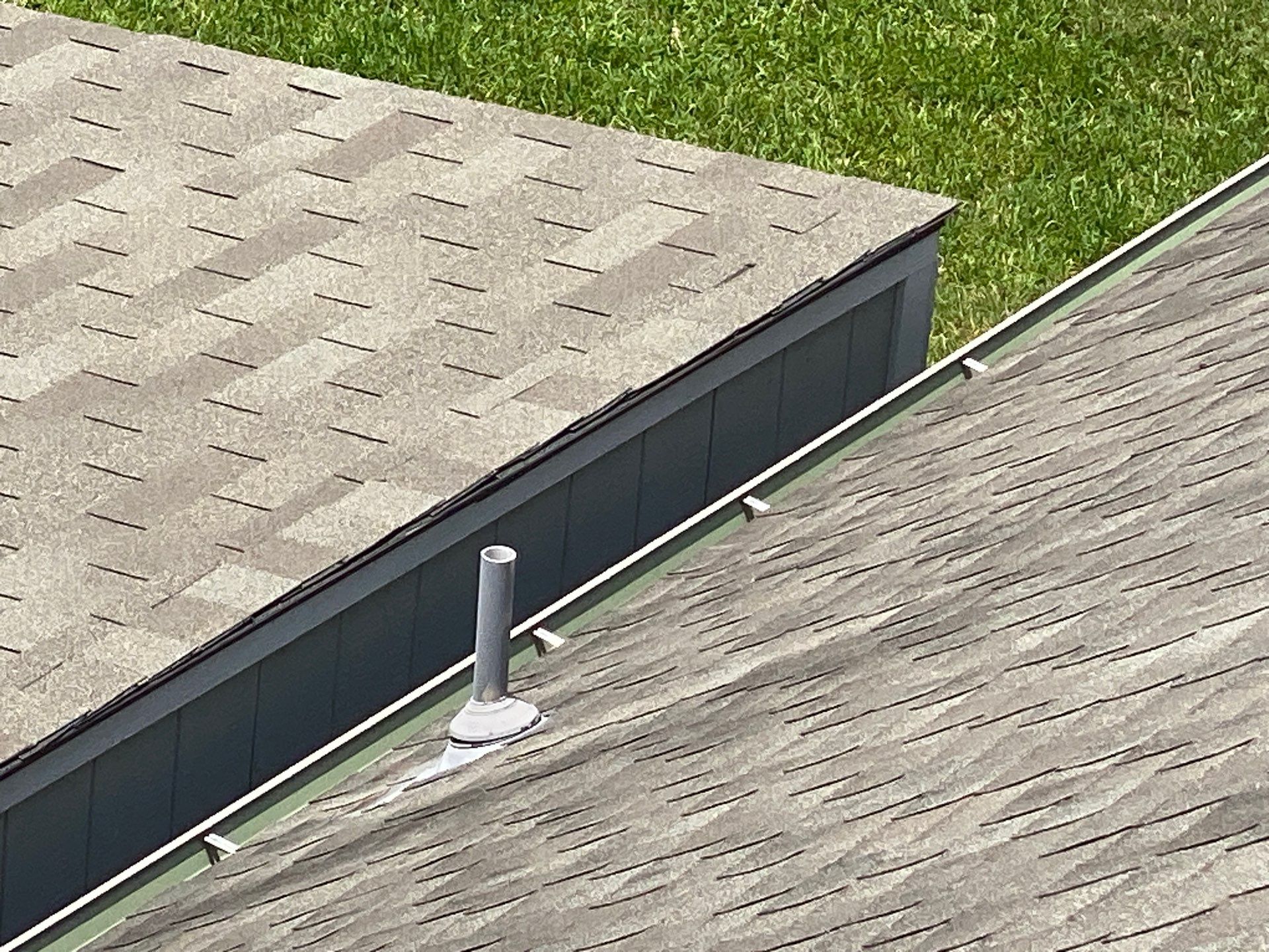 Hail Damage using Owen's Corning Duration (Lifetime) Shingles by Roof Repair Company