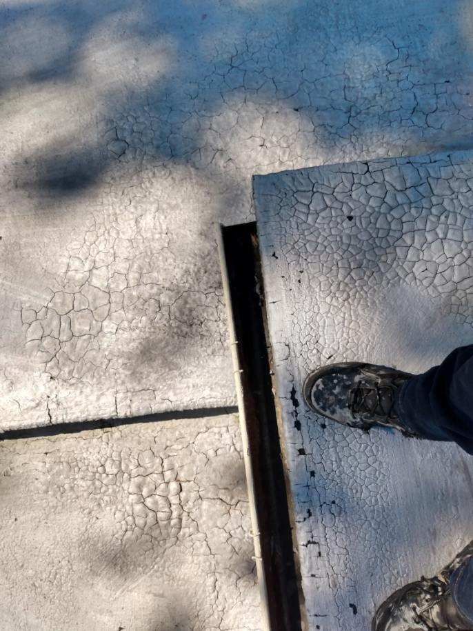 Slate Roof Repair & Gutter Cleaning in Roland Park by Roof Right Inc