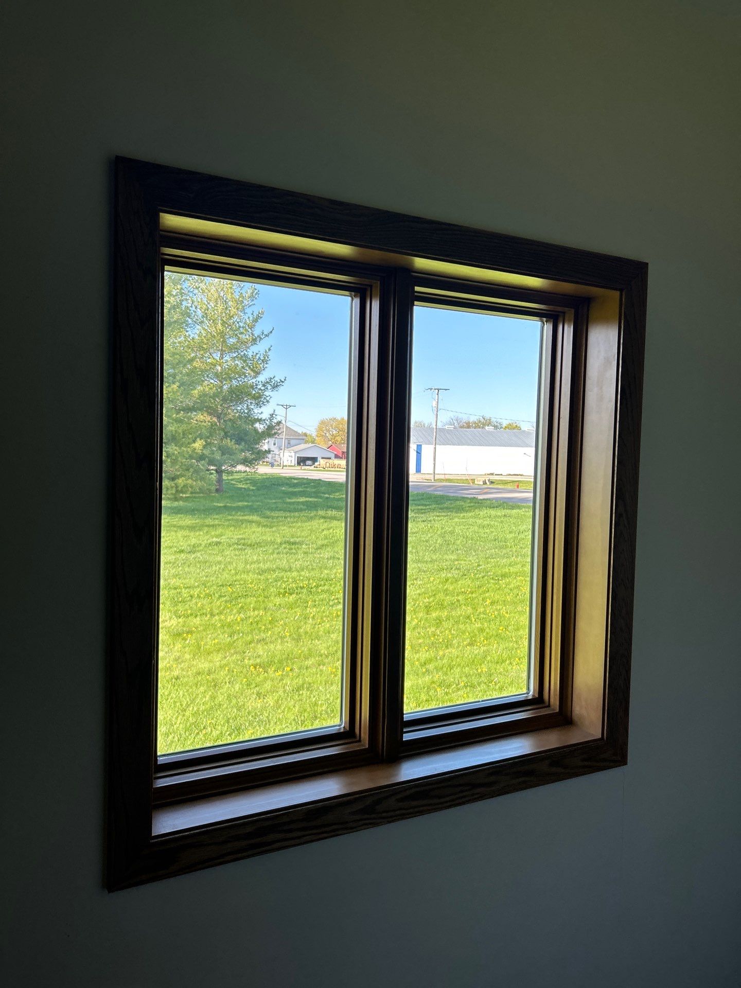Window replacement using Pella Lifestyle wood/Aluminum window by United Windows and Siding LLC