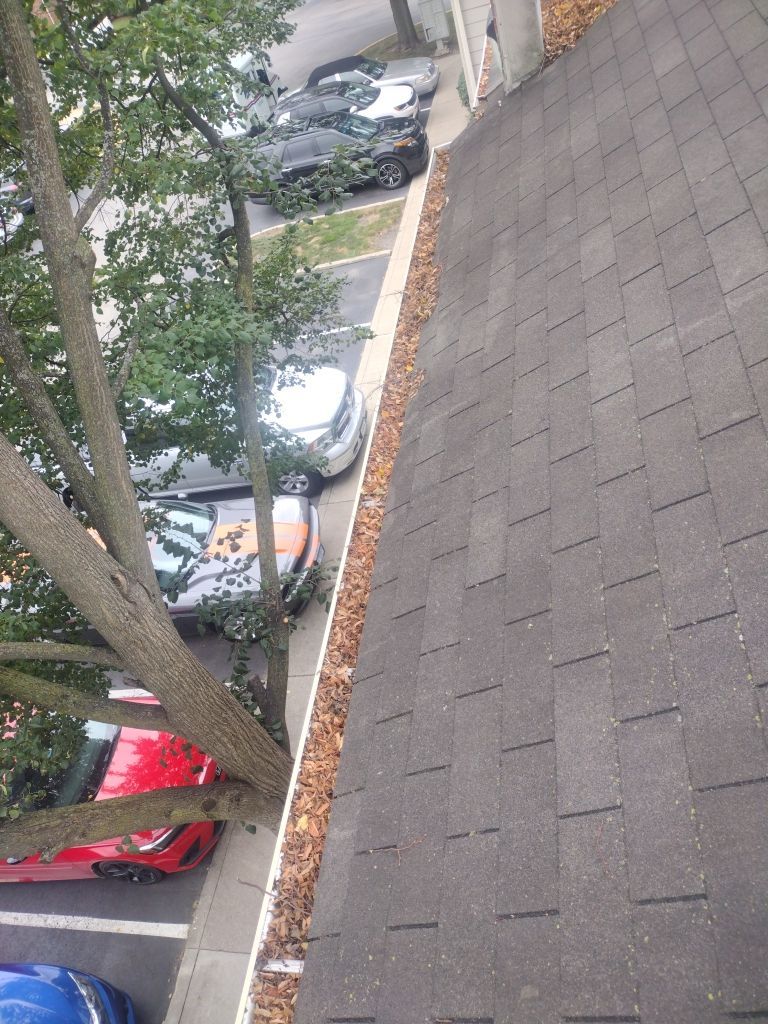 Commercial gutter cleaning Naperville & Aurora, IL
before photo with filled gutters