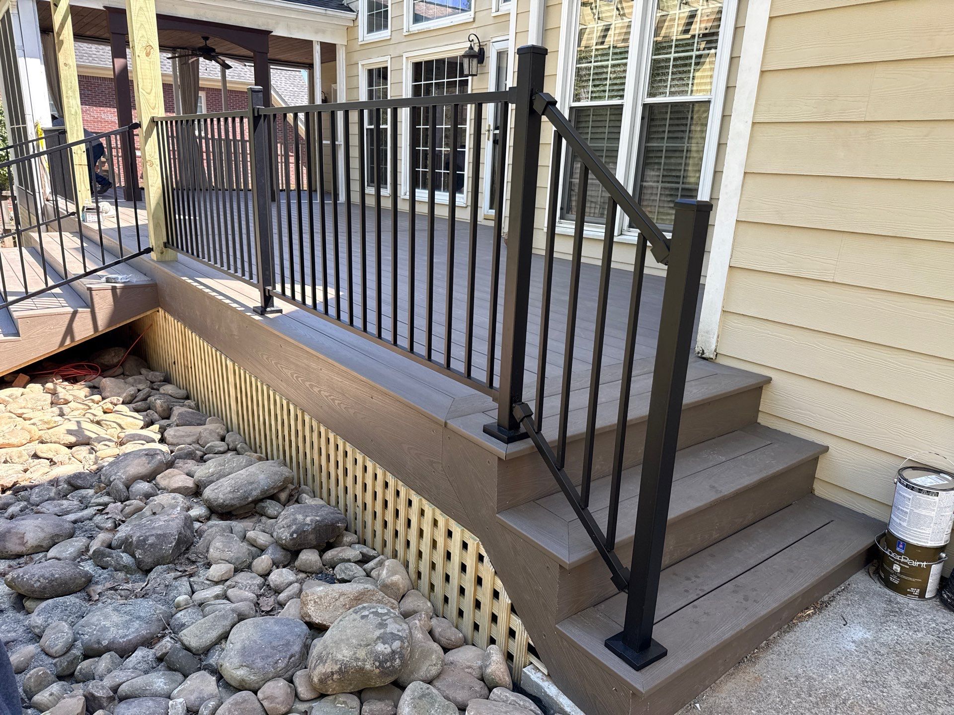 Marietta, GA Deck Replacement using Deckorators Venture Series Decking and Trex Steel Railing by Nelson Exteriors 