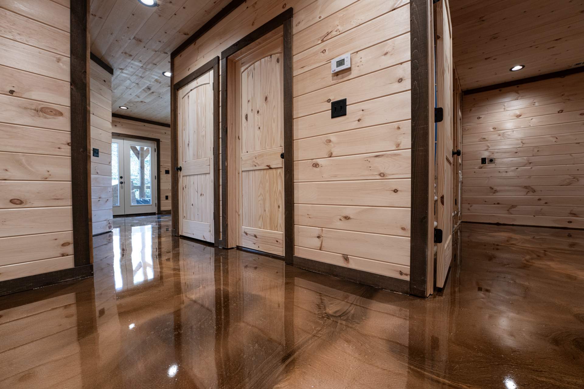 Stunning Metallic Epoxy Basement Installation by Elite Floor Solutions