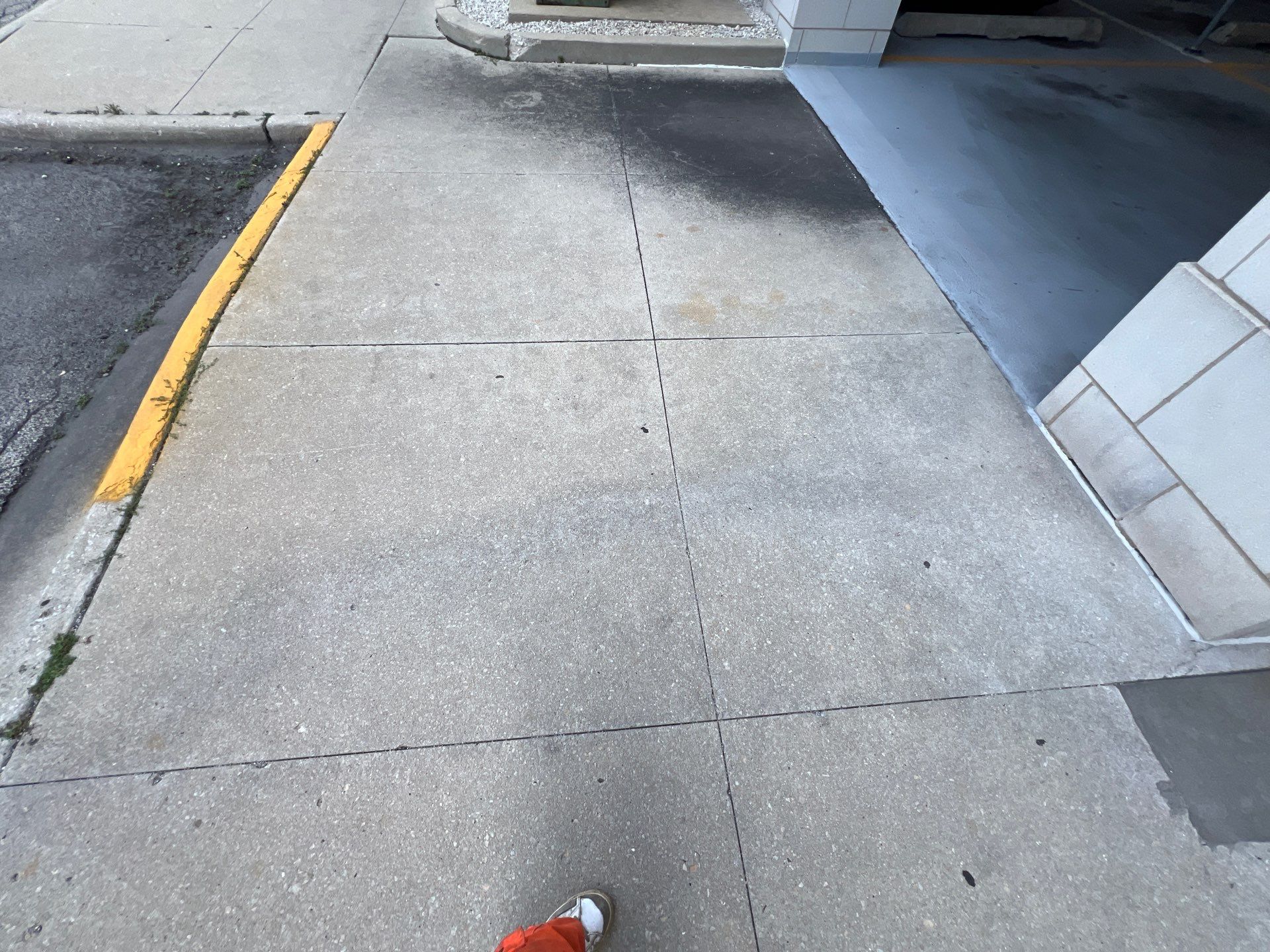 Parking garage using Hot water by Northern Power Washing LLC.