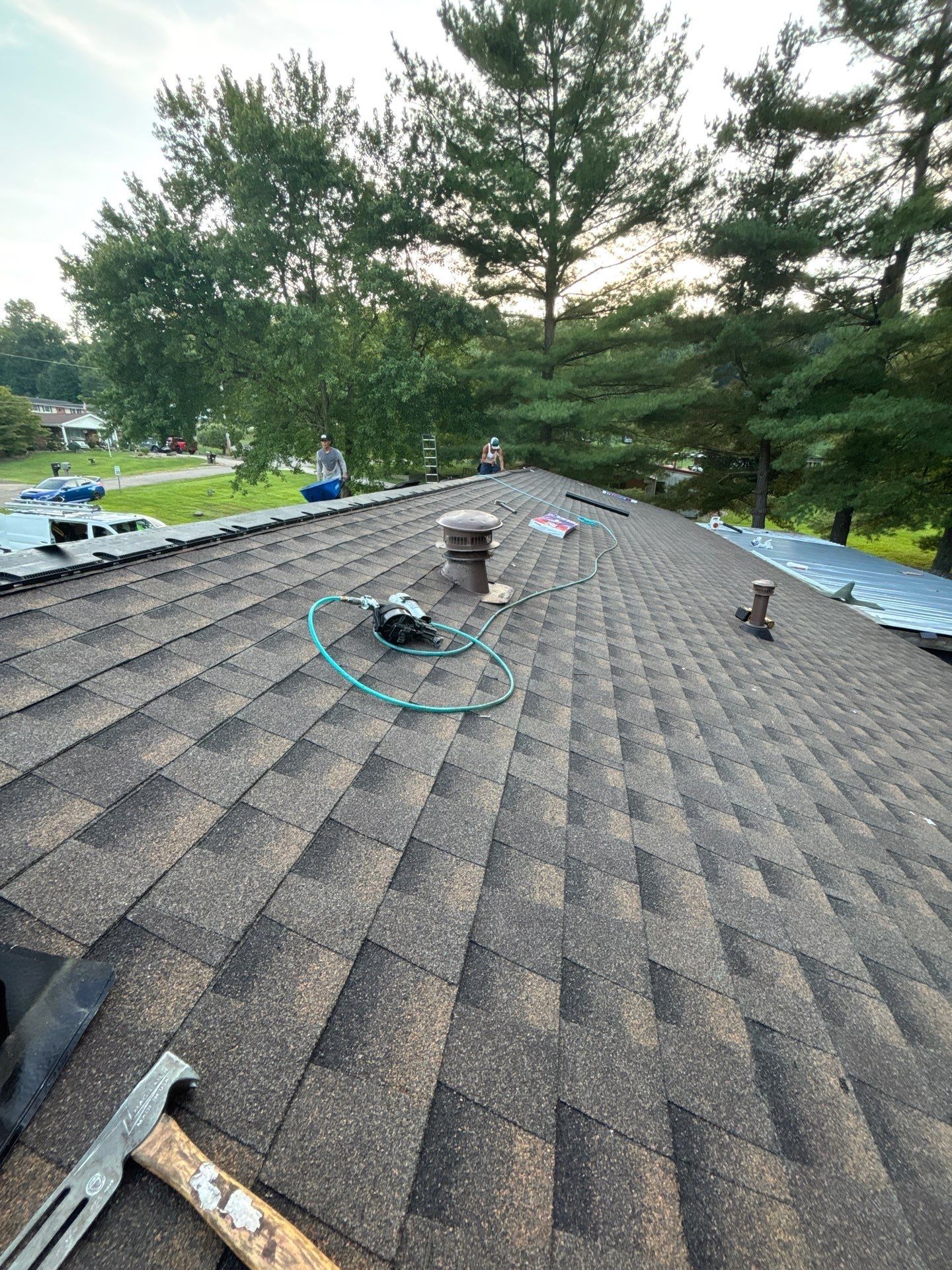 Residential Roofing Installation using GAF Timberline HDZ Charcoal by Rainstoppers Roofing