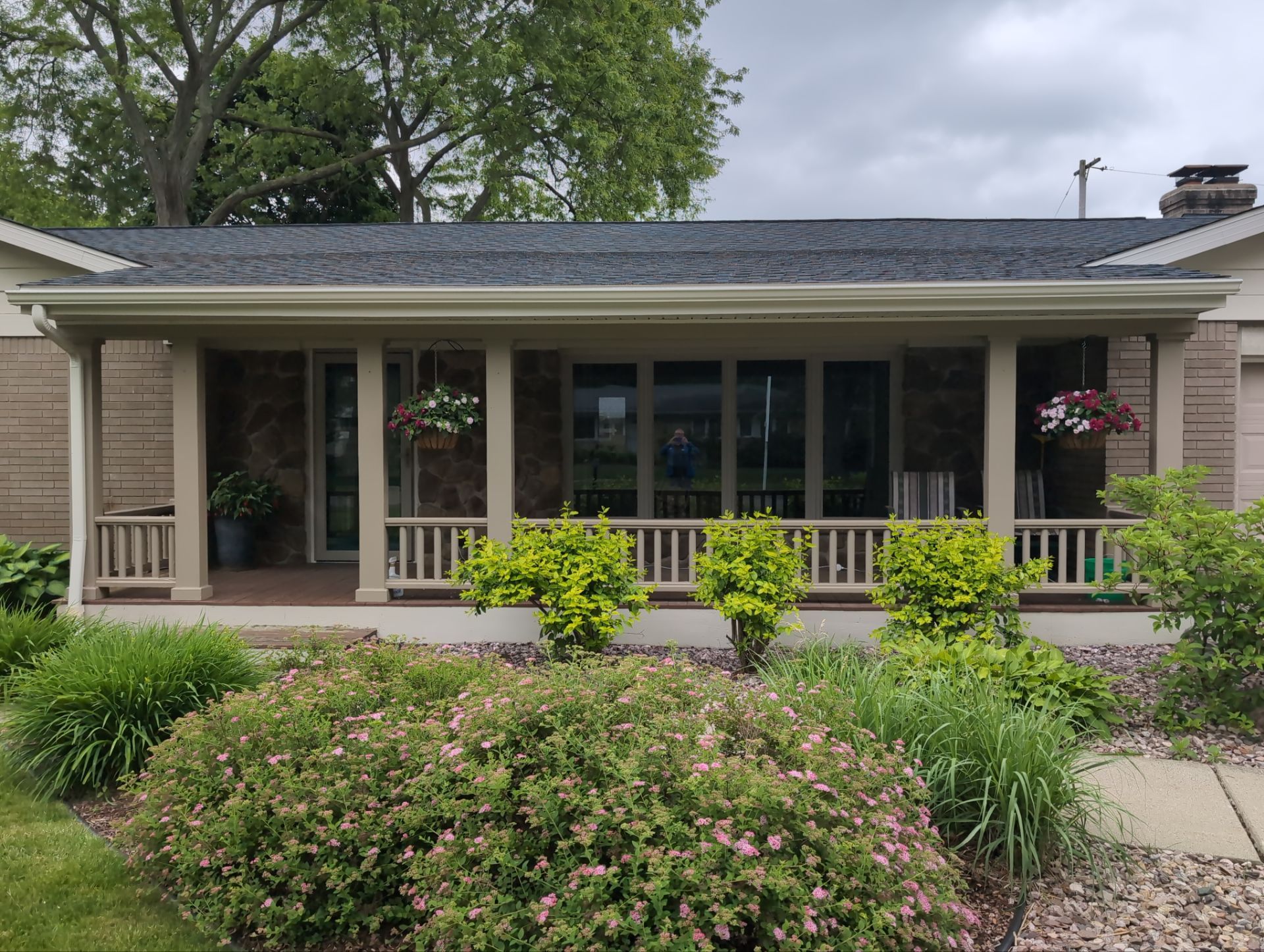 Installing new Roof, Fascia, Soffit, and Gutters. New custom trim around garage door. by Acme Exteriors
