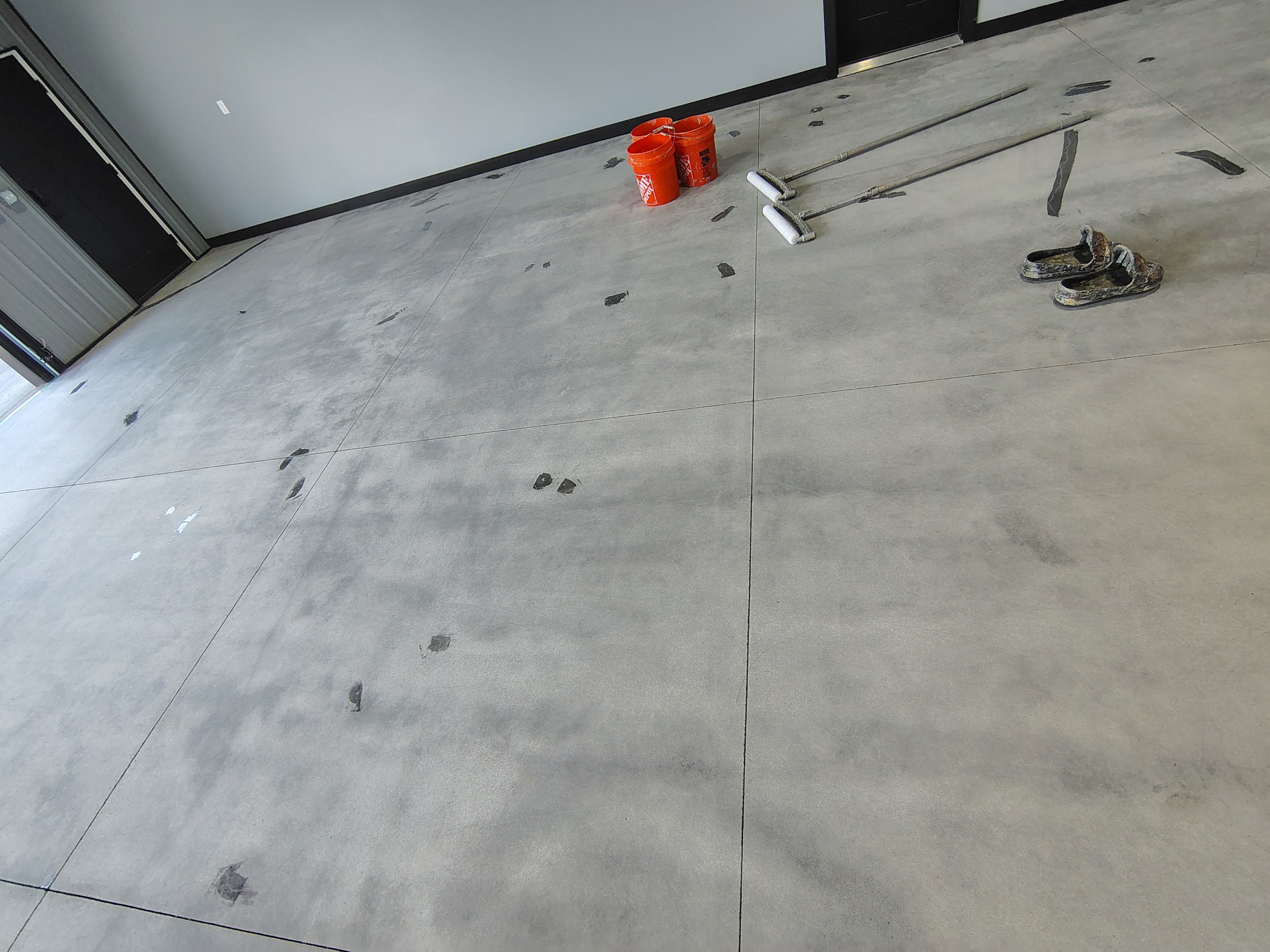 Polyaspartic Garage Floor Coating with Decorative Flake in Wentworth by Select Painting, Coatings & Garage Cabinets