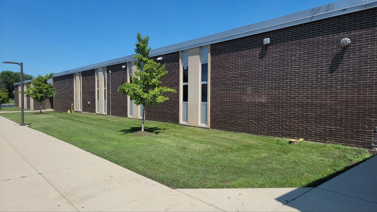 commercial pressure washing using Algaecide, soft wash soap by Northern Power Washing LLC.