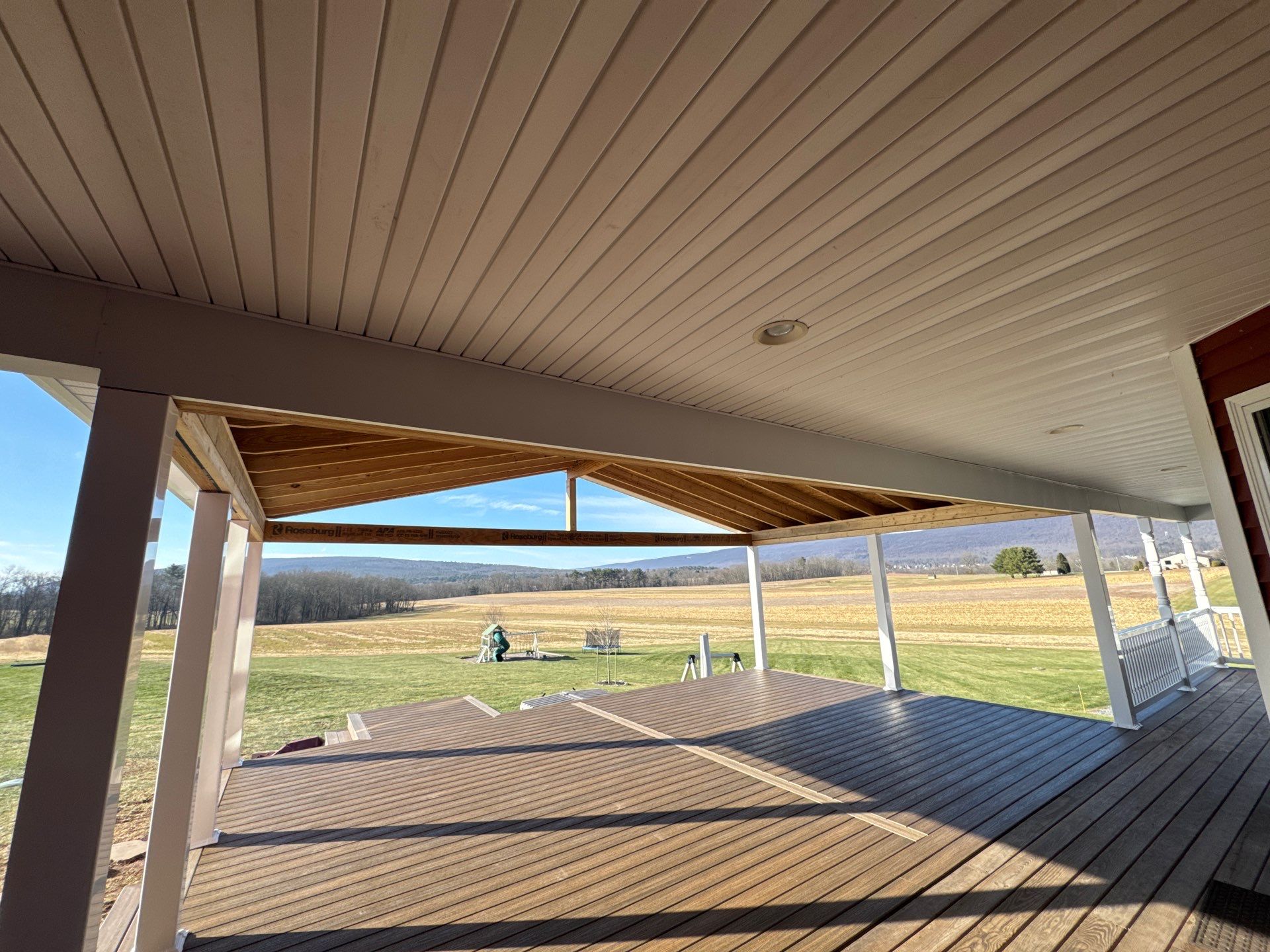 Covered Deck Addition With Custom Gable Roof in Tower City by Esh Builders