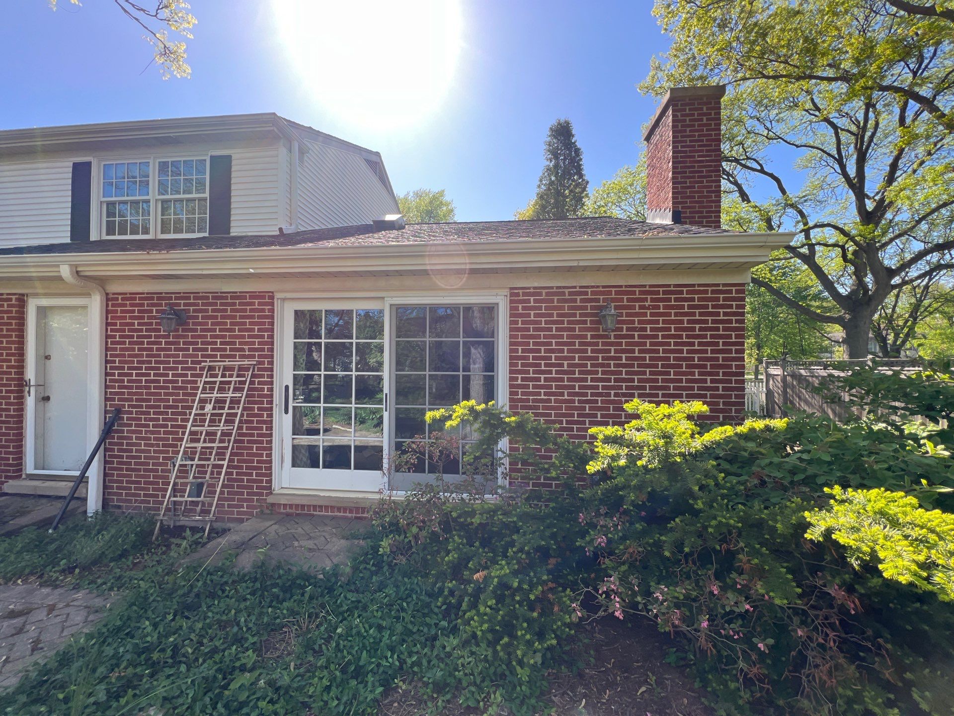 Housewashing  using Algaecide, soft wash soap by Northern Power Washing LLC.