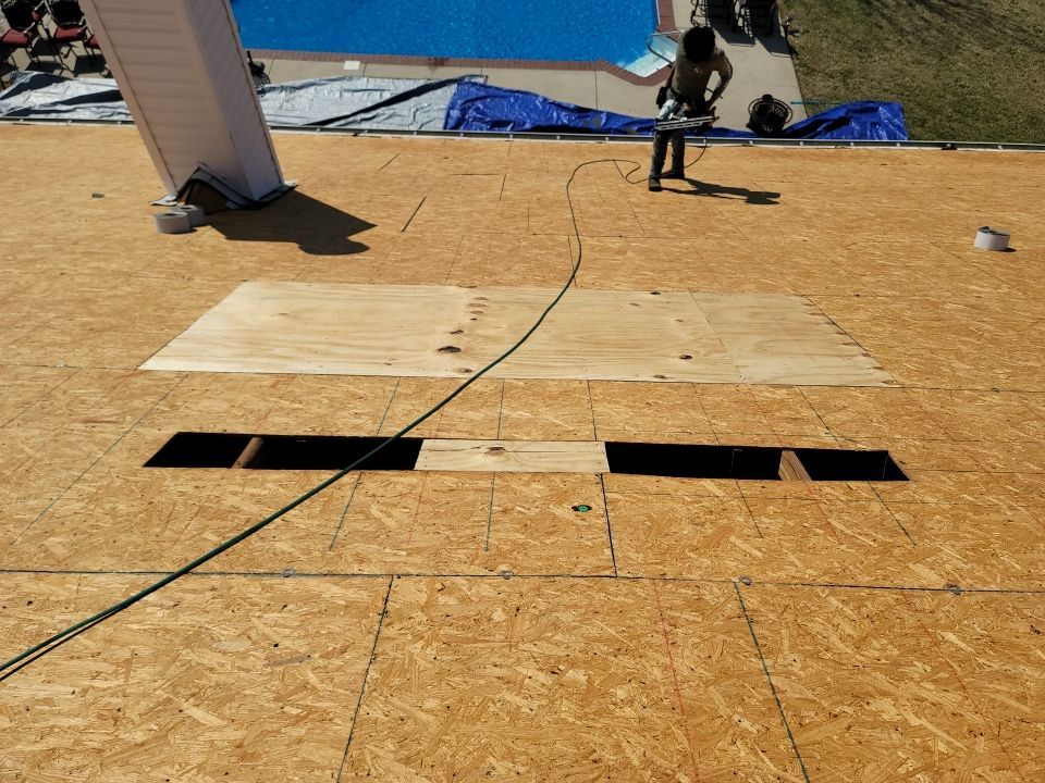 Residential Roofing Installation using Roof Replacement by American Roofing & Construction LLC