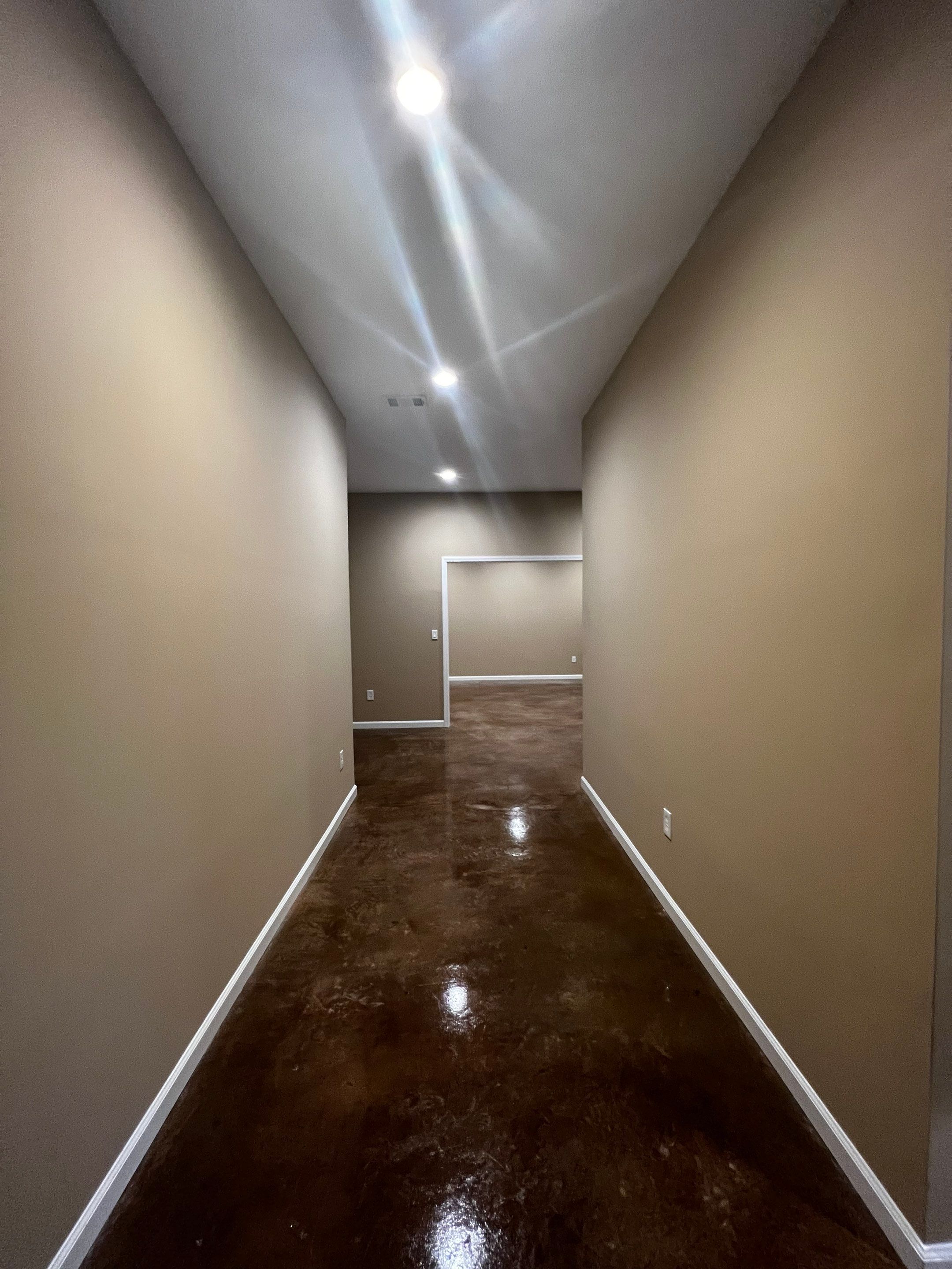 Finished Basement Renovation Featuring Polished Concrete in Atlanta by Swift Home Renovations
