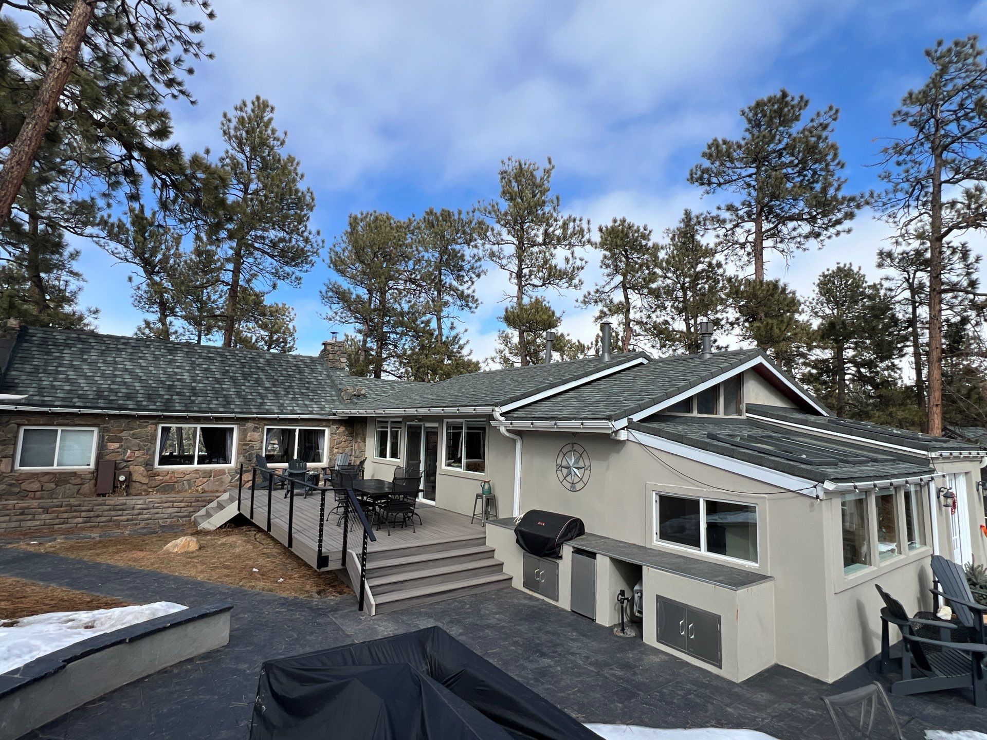 Residential Roofing Installation using Stone Coated Steel by Blue Peaks Roofing LLC 