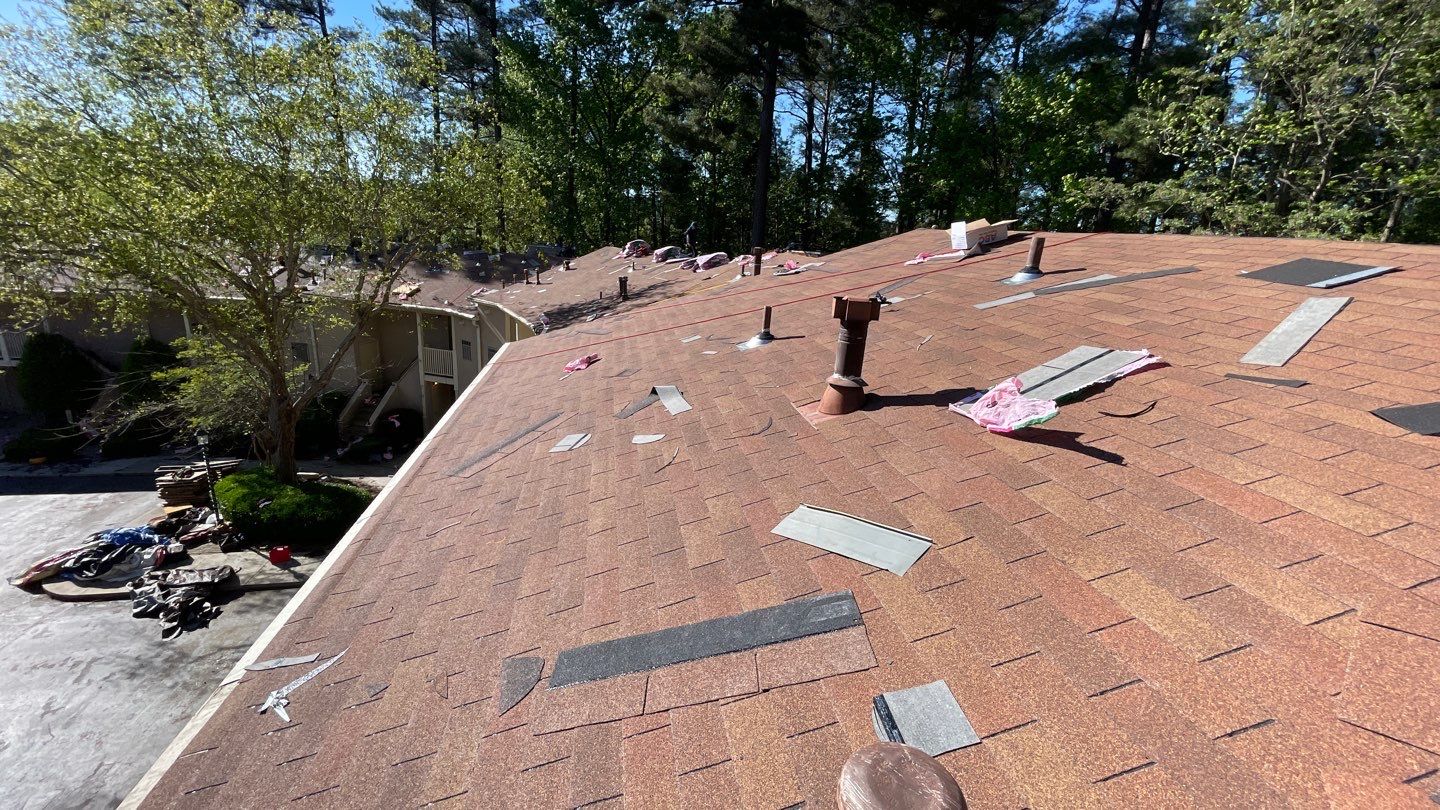 Commercial Roofing Installation using Owens Corning Autumn Brown by Inspector Roofing and Restoration