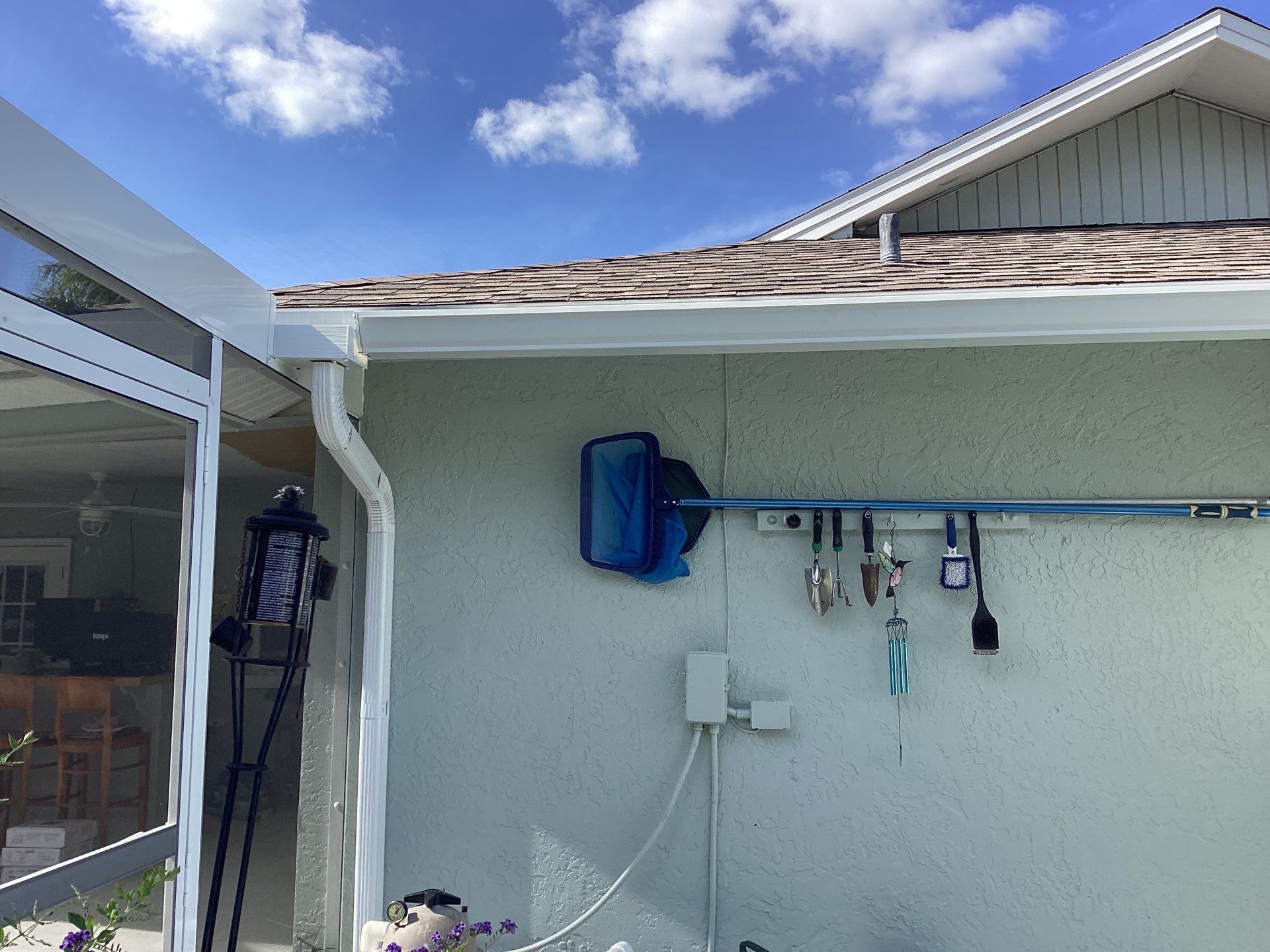 Downspout Installation using 3X4 Elbow Downspout in Cape Coral FL by Gutter Professors