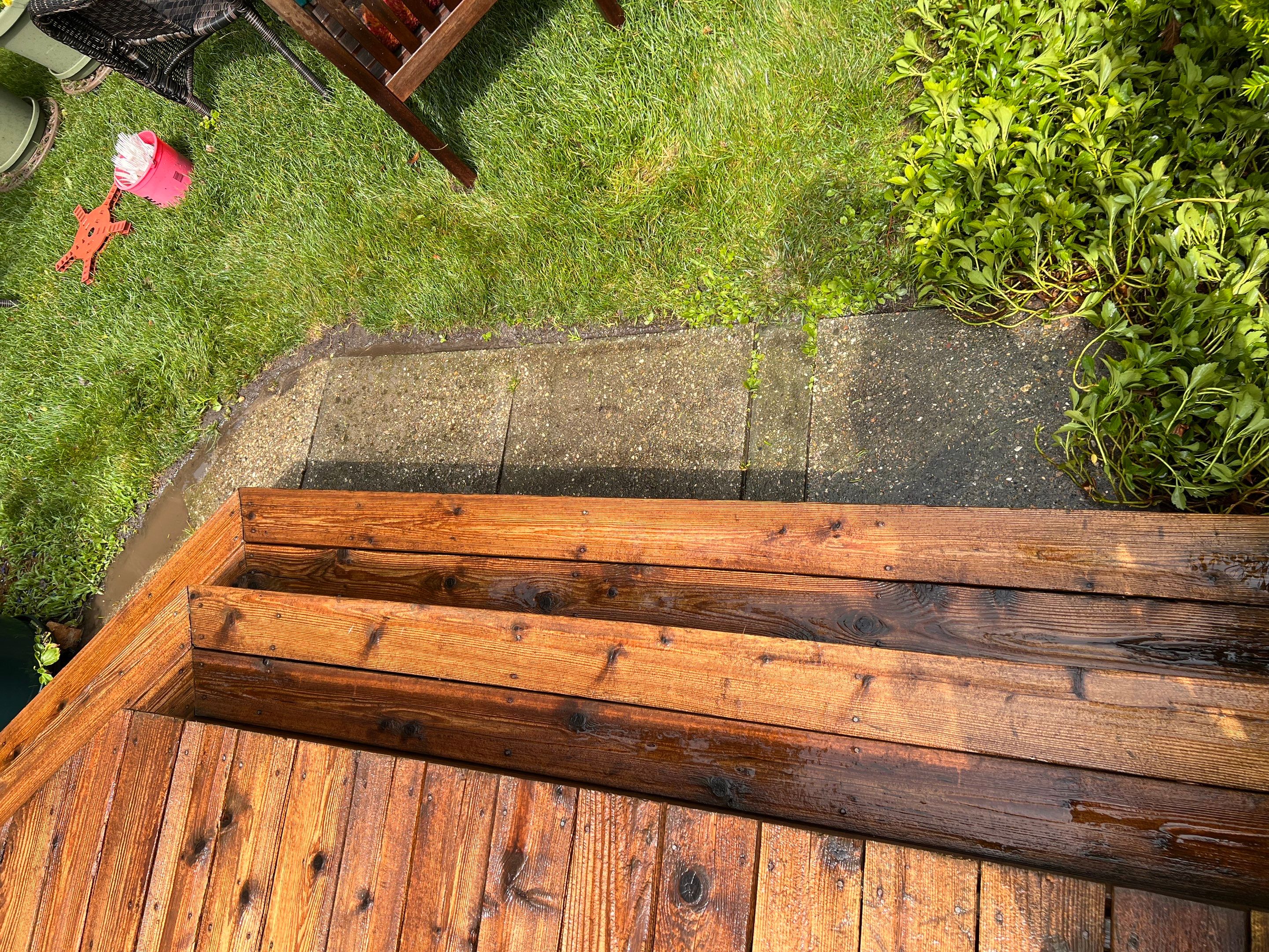 Wood deck cleaning, board replacement and staining by Northern Power Washing LLC.