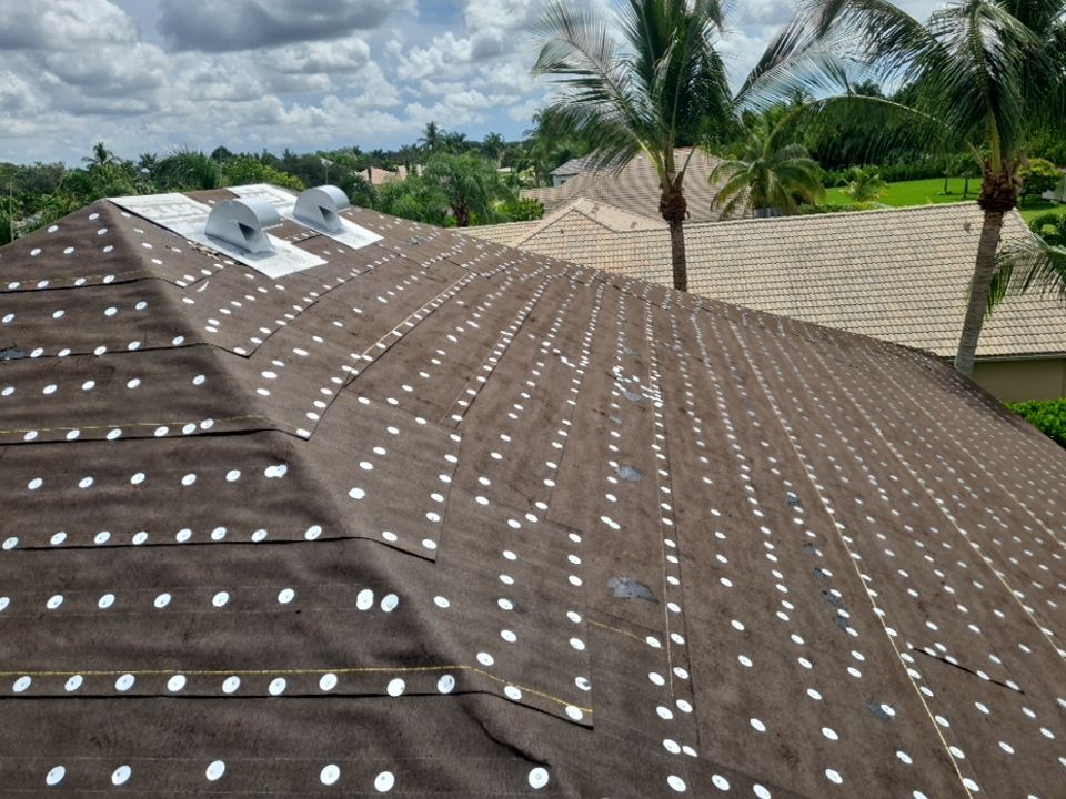 Residential Roofing Installation using 1" Nail strip metal roof by BLUES BROTHERS ROOFING