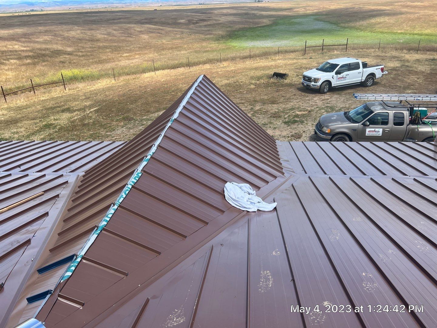 Metal roofing installation using Standing seam metal roofing system by Straight Edge Roofing Inc