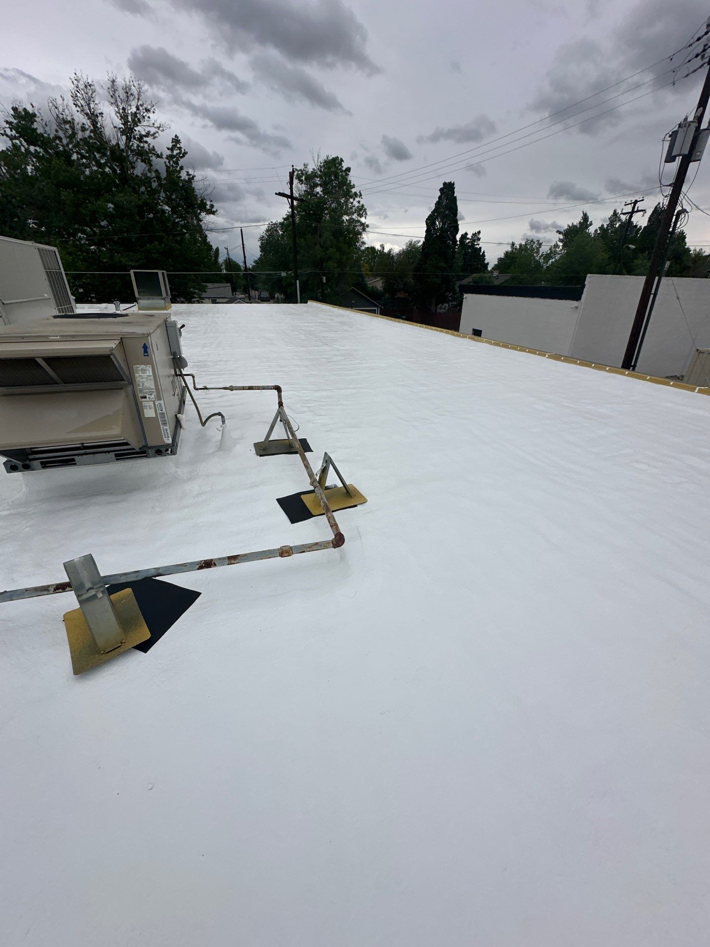 Complete Roof Coating System by Blue Peaks Roofing LLC