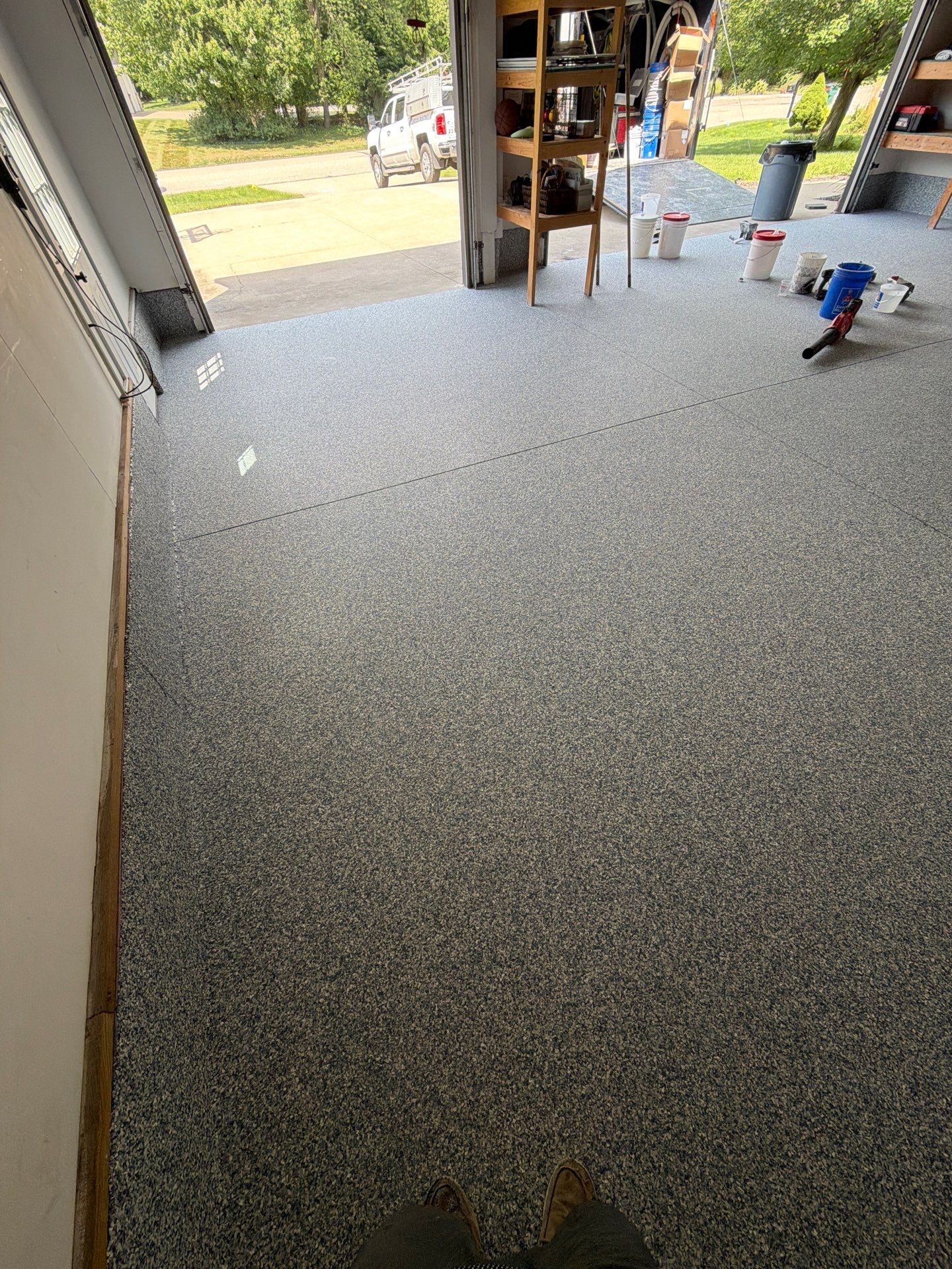 Custom Tidal Wave Epoxy Flake Floor Installation in Norton Shores. by Gordon Painting