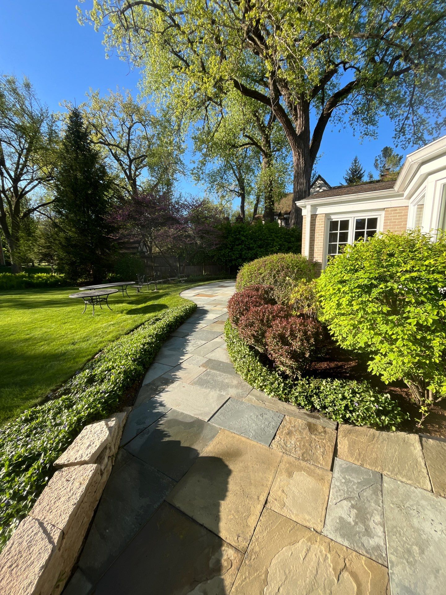 natural stone using Algaecide, soft wash soap by Northern Power Washing LLC.