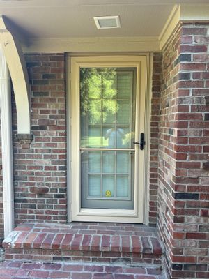 Tan Storm Door Installation in Zionsville Brick Entryway
