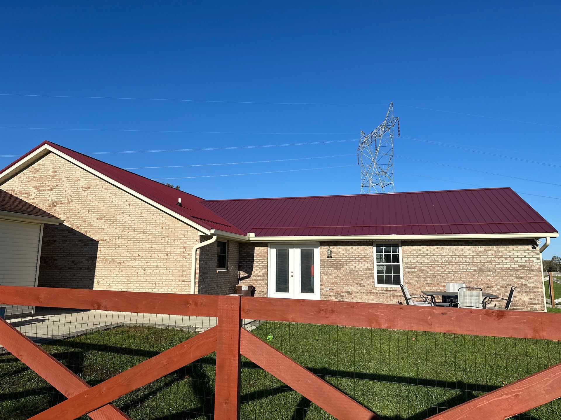 Residential Roofing Installation using Performance Panel Metal - Burgandy by RoofX 