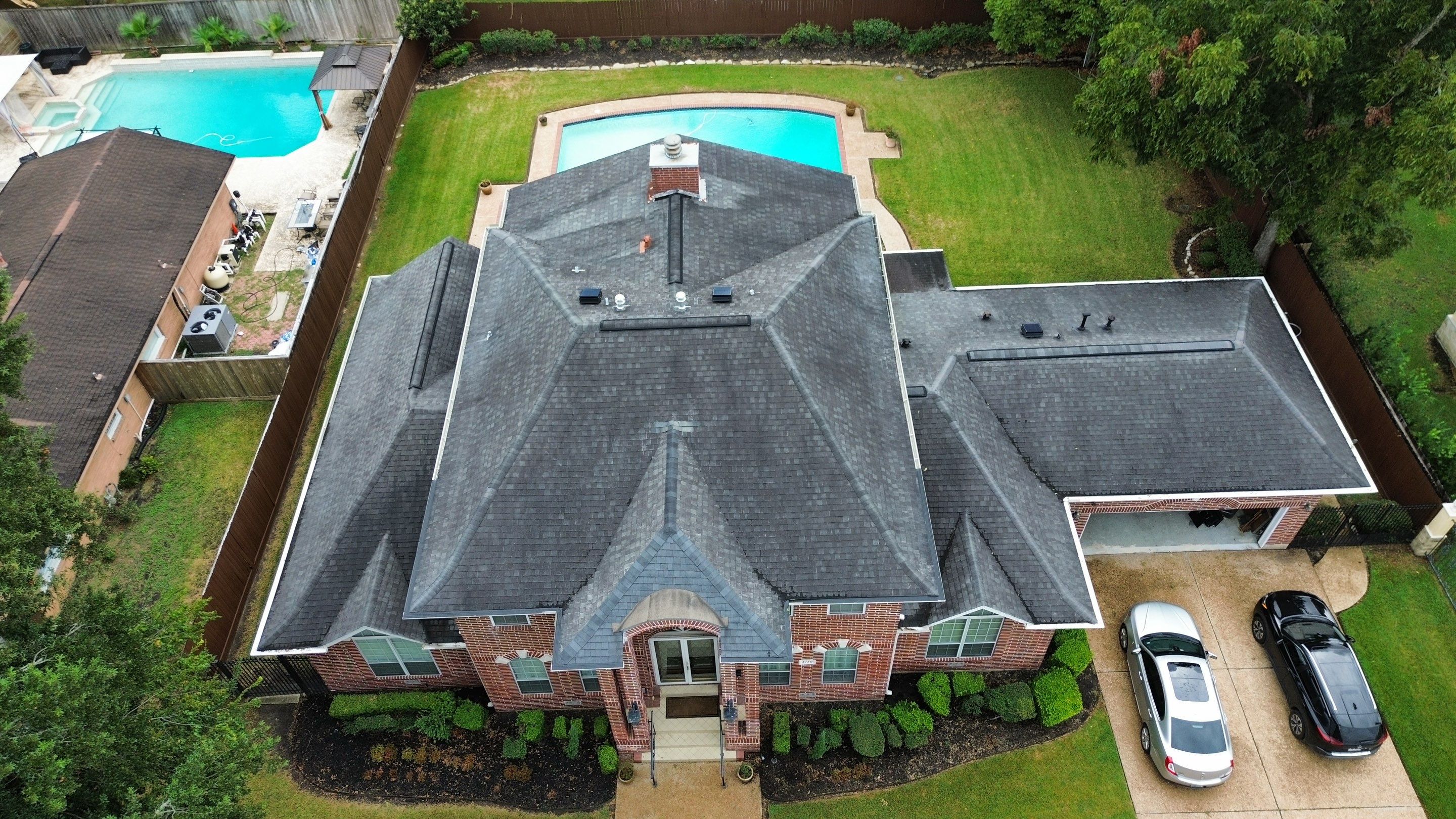 Stately Houston Roof Replacement With Owens Corning Duration Shingles by Houston Roofing & Construction