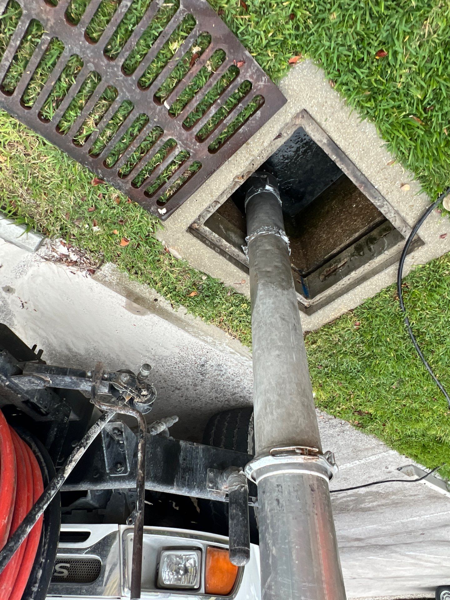 Stromwater System Maintenance at Bill Smith Appliances / Critter Cafe Marco Island Catch Basin by Don Mar, Inc. Storm Water Solutions