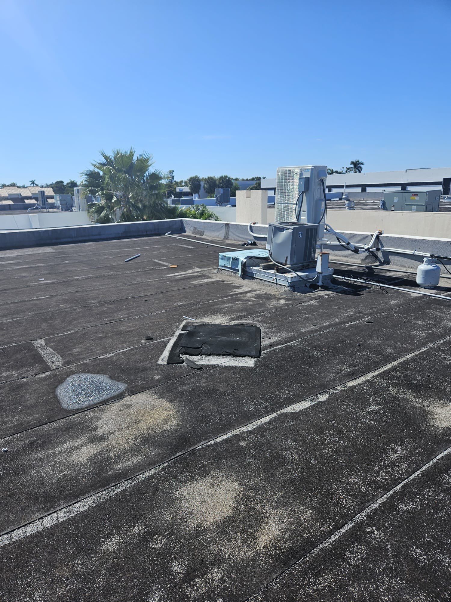 Commercial Roofing Repair using Roof Sealant by Four Peaks Roofing