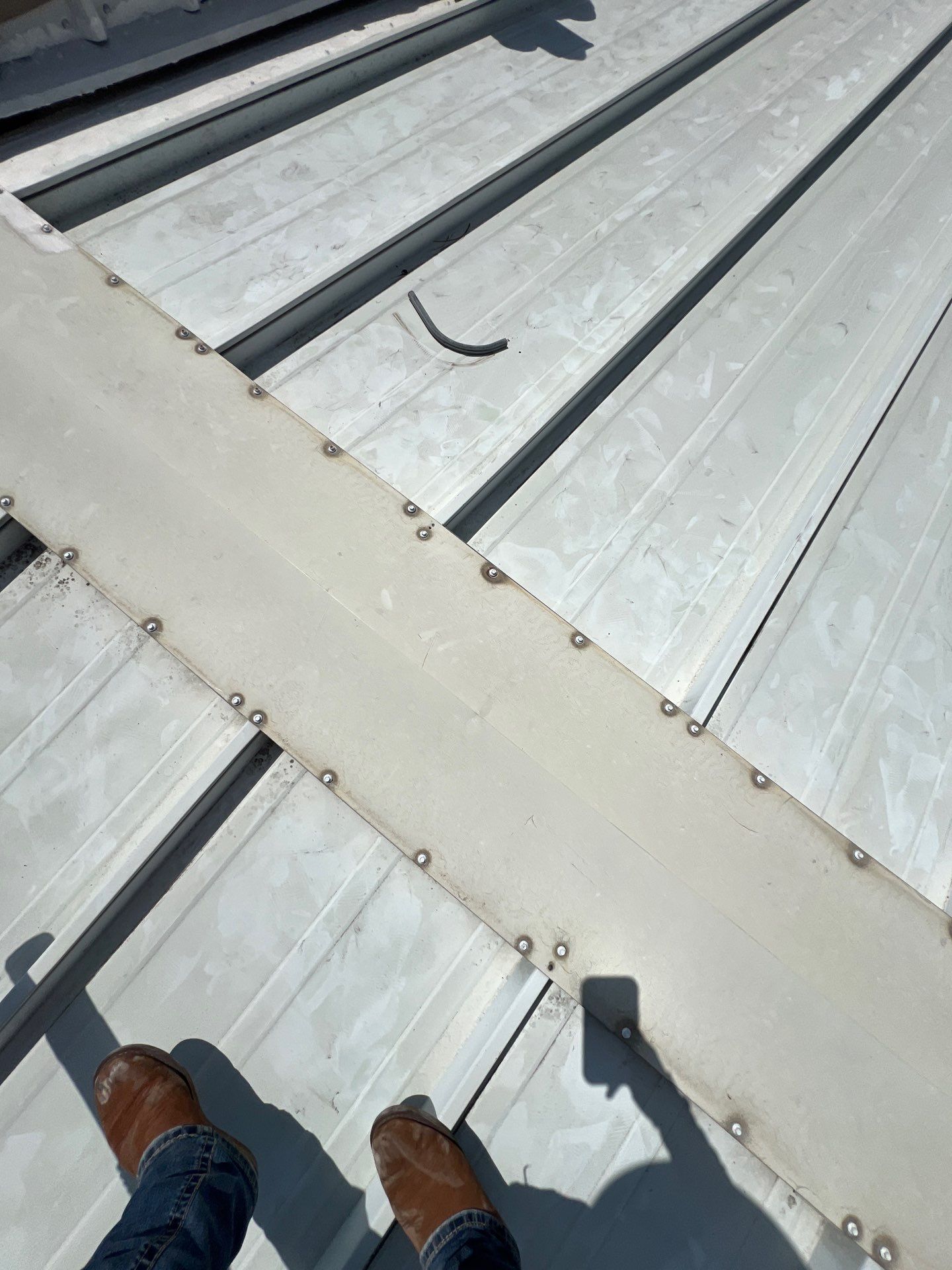 Commercial Roofing Repair using Metal by Roof Repair Company