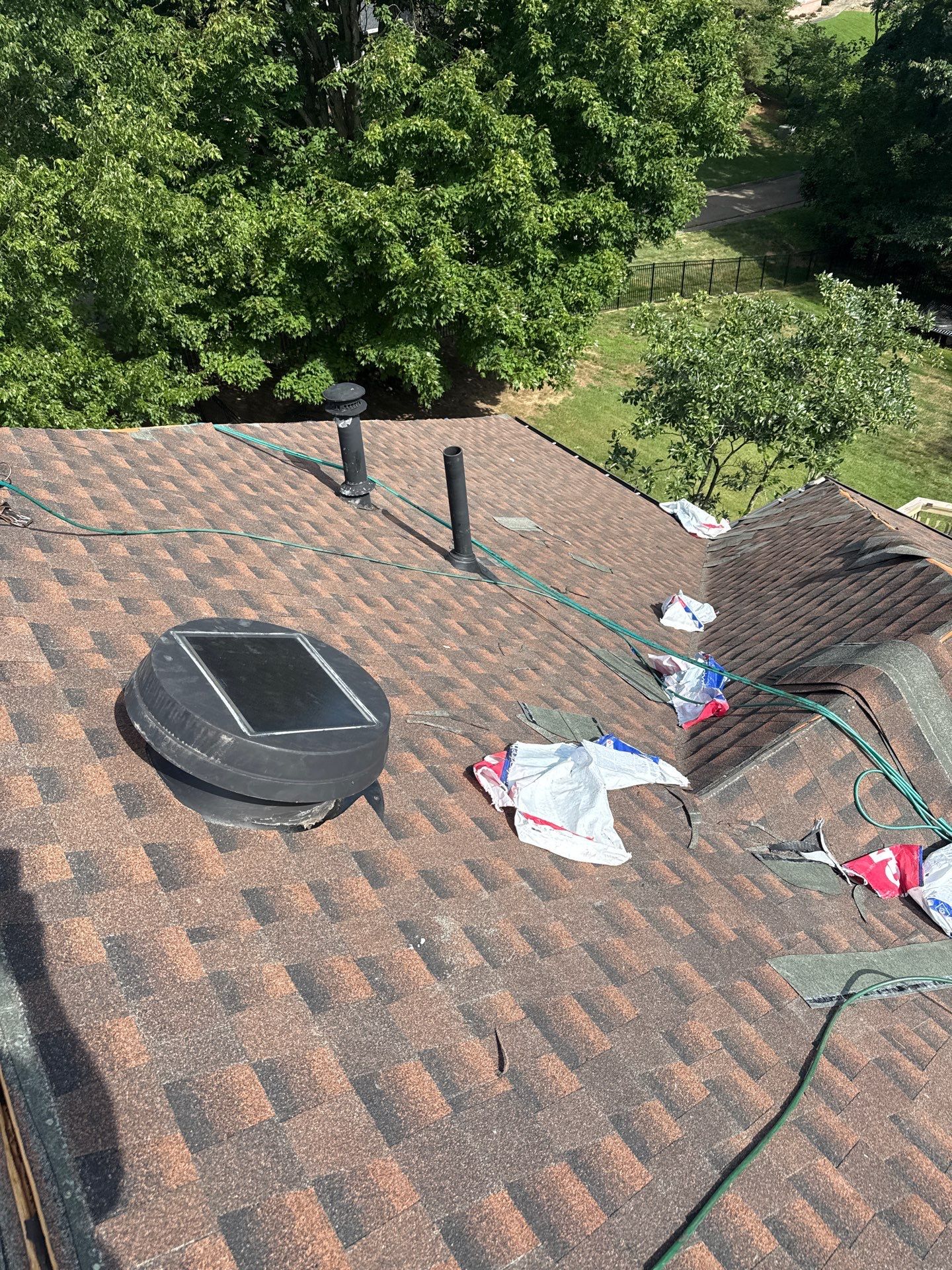 Residential Roofing Installation using GAF TImberline HDZ Hickory by Rainstoppers Roofing