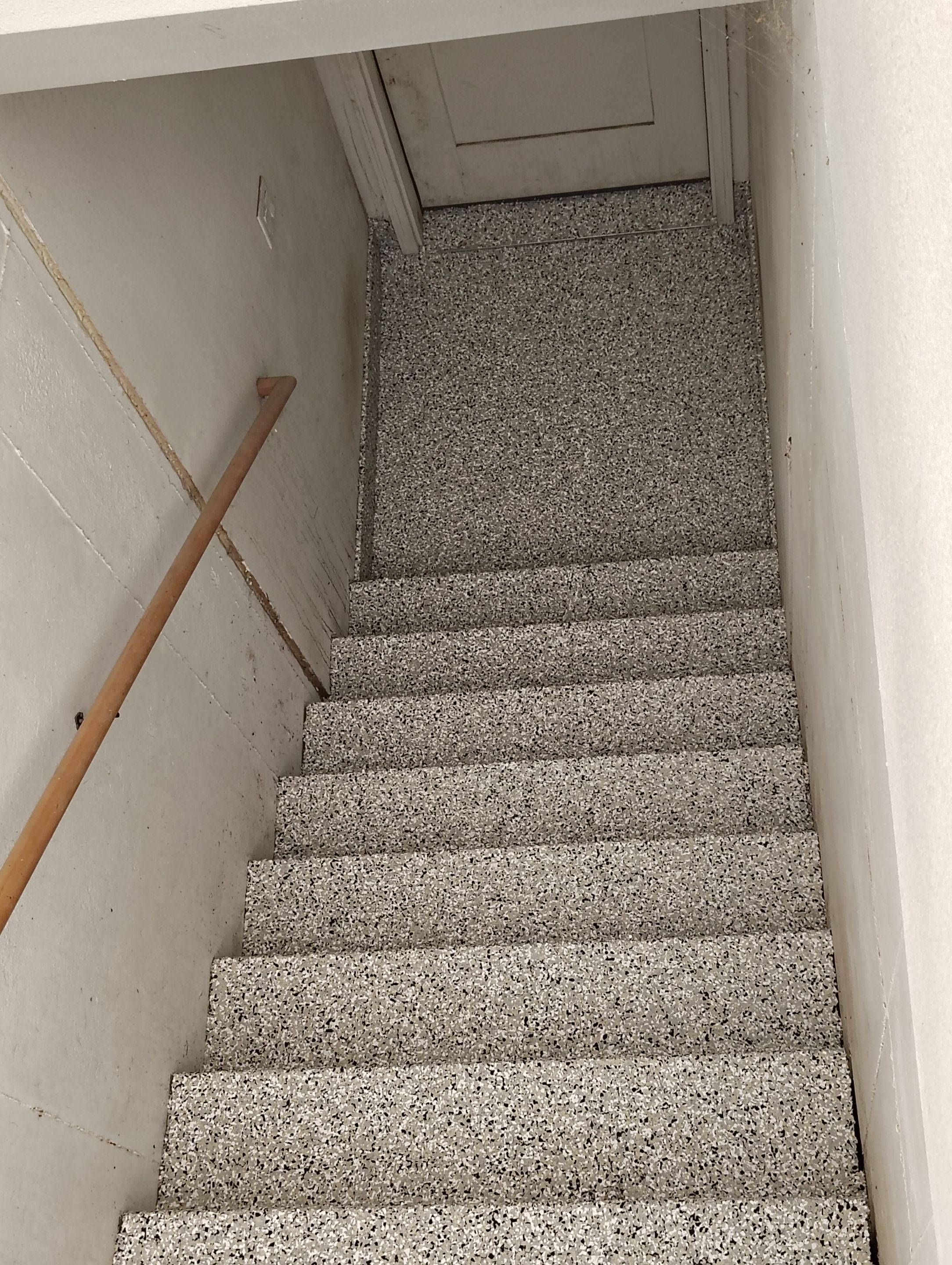 Epoxy Flake Garage Floor and Stair Coating in Sioux Falls by Select Painting, Coatings & Garage Cabinets